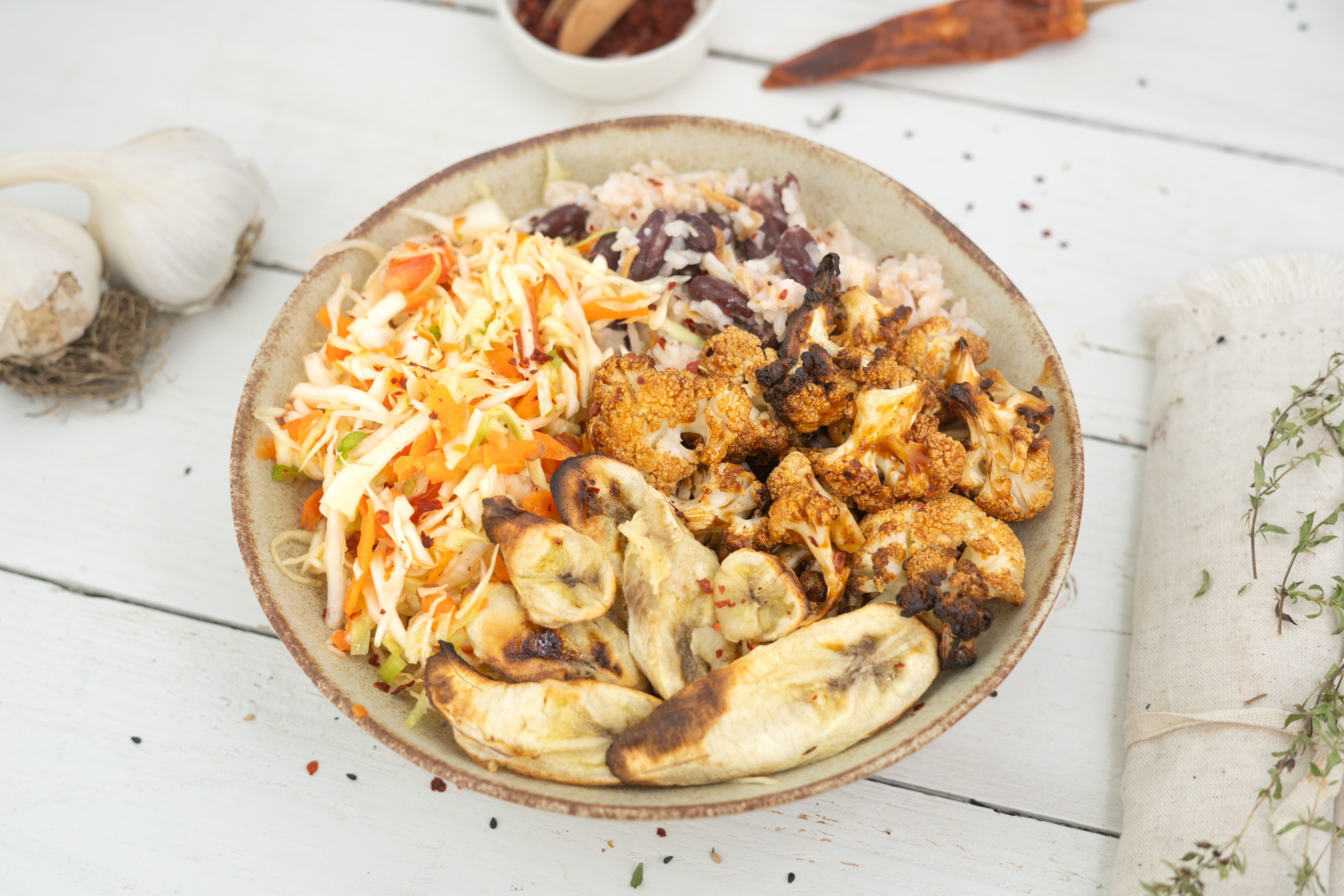 Rezept Serviervorschlag Jamaikanische Blumenkohl Kraut Bowl