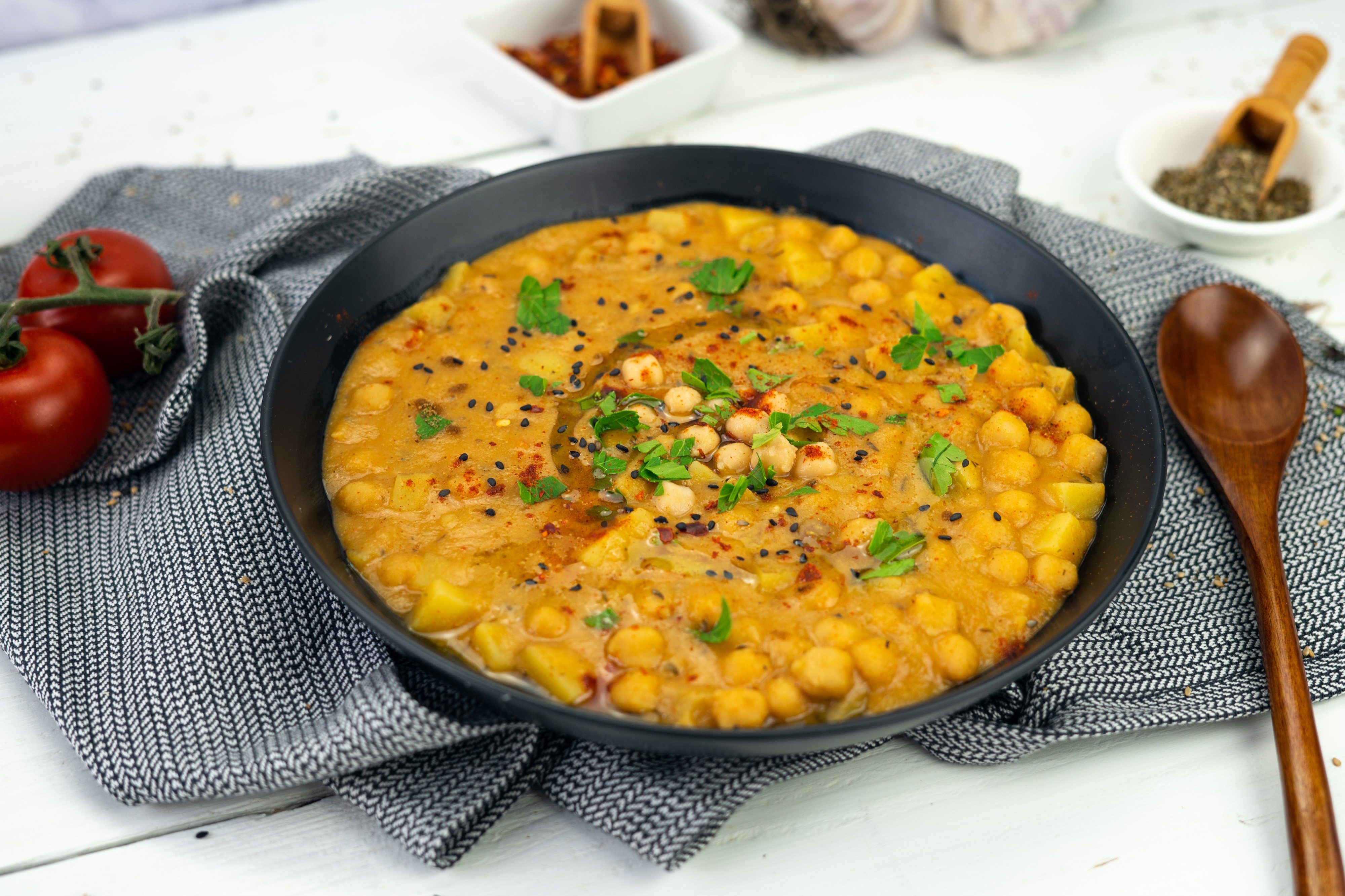Rezept Serviervorschlag Würzige Kichererbsen Kartoffelsuppe