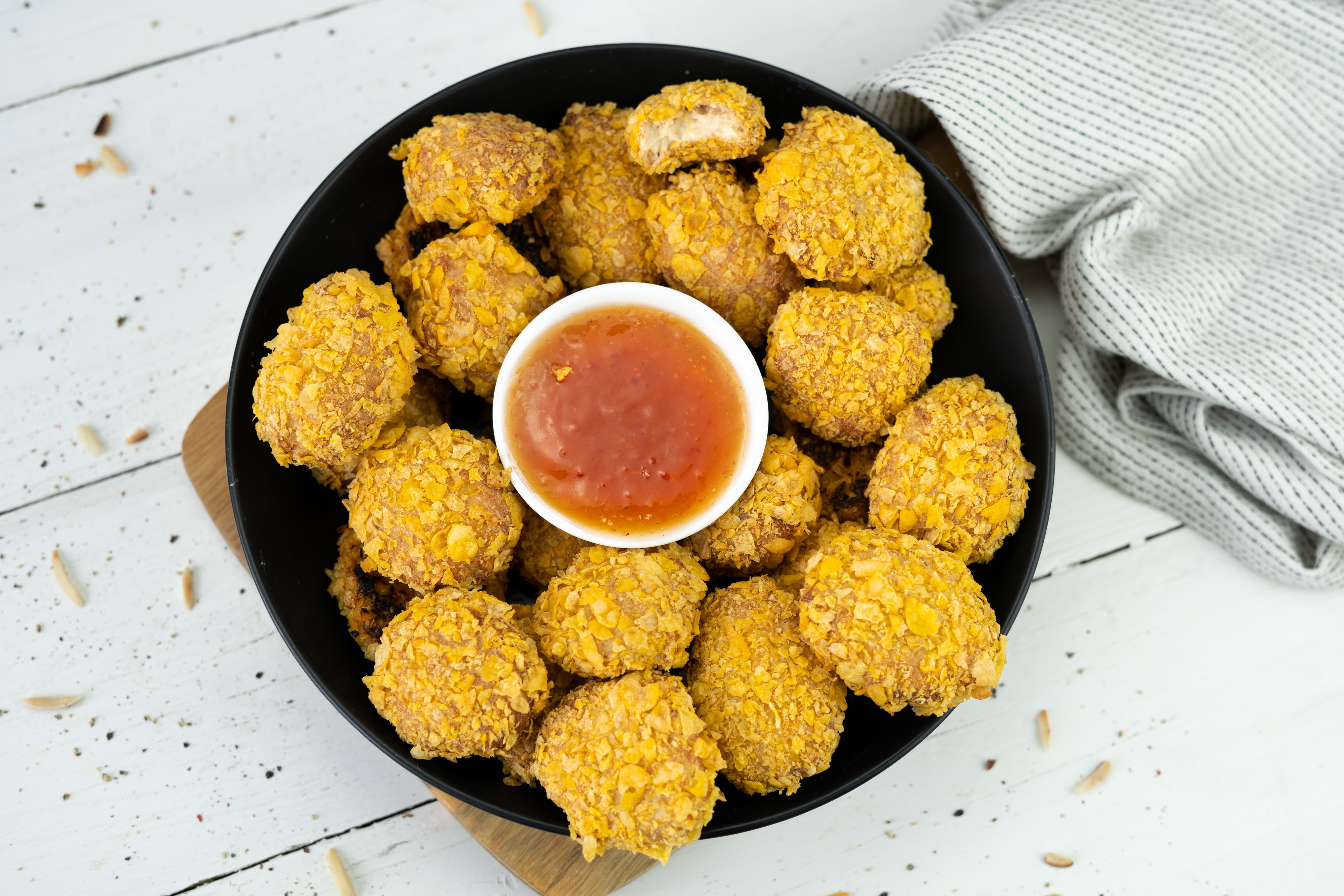 Rezept Serviervorschlag Blumenkohl Nuggets mit Cornflakes Panade
