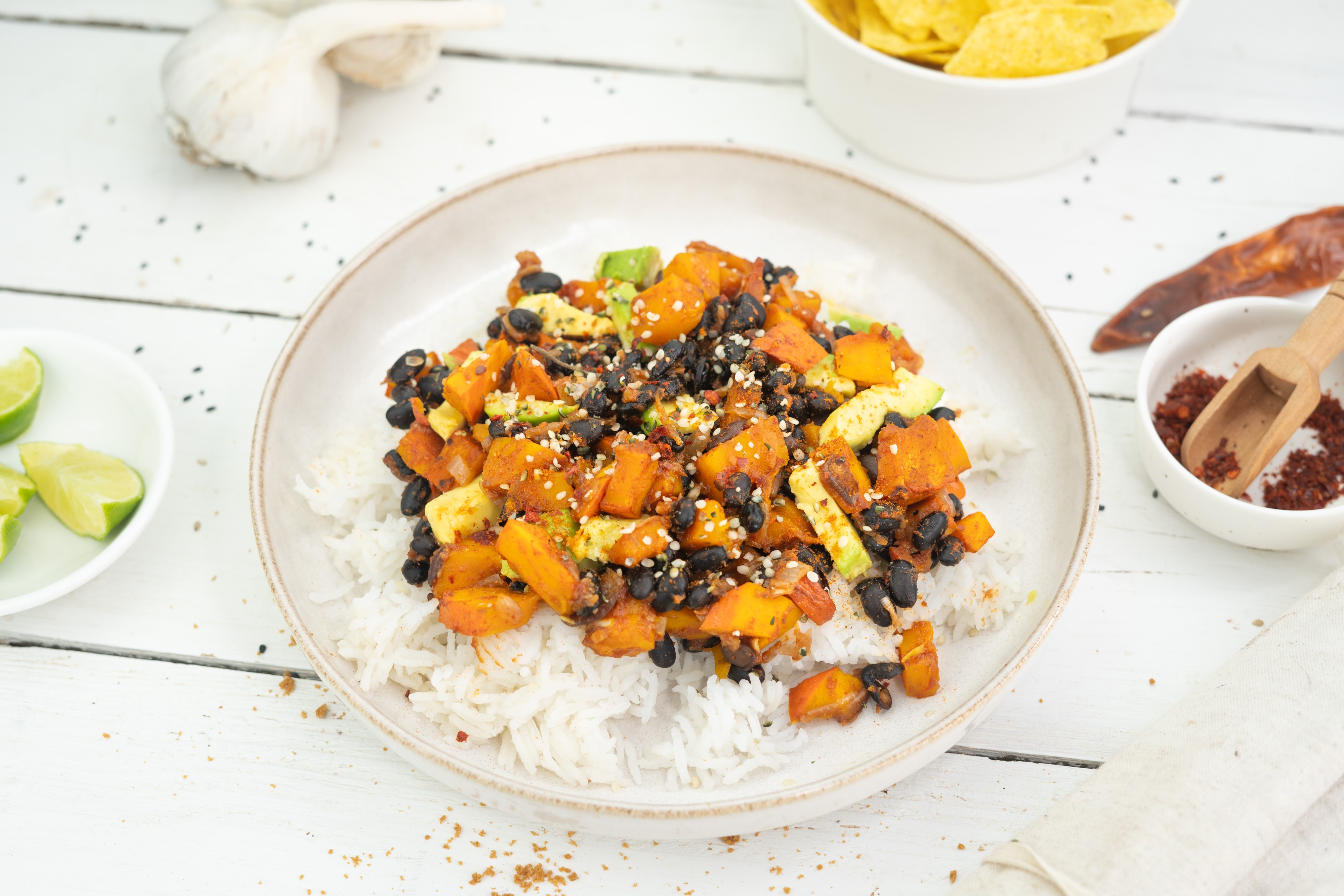 Rezept Serviervorschlag Gerösteter Chipotle Kürbis mit schwarzen Bohnen