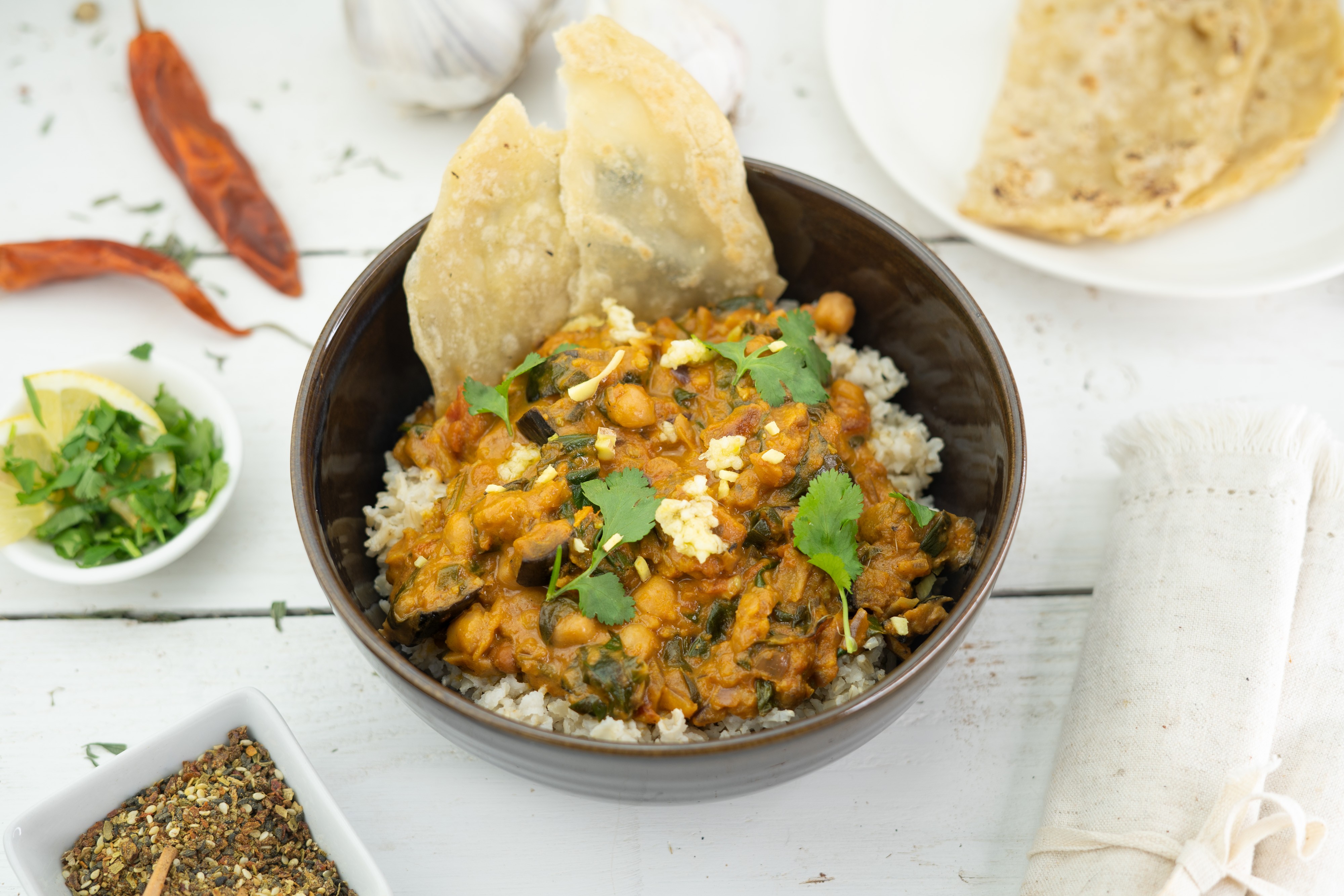 Rezept Serviervorschlag Indisches Kichererbsen Spinat Curry mit Melanzani