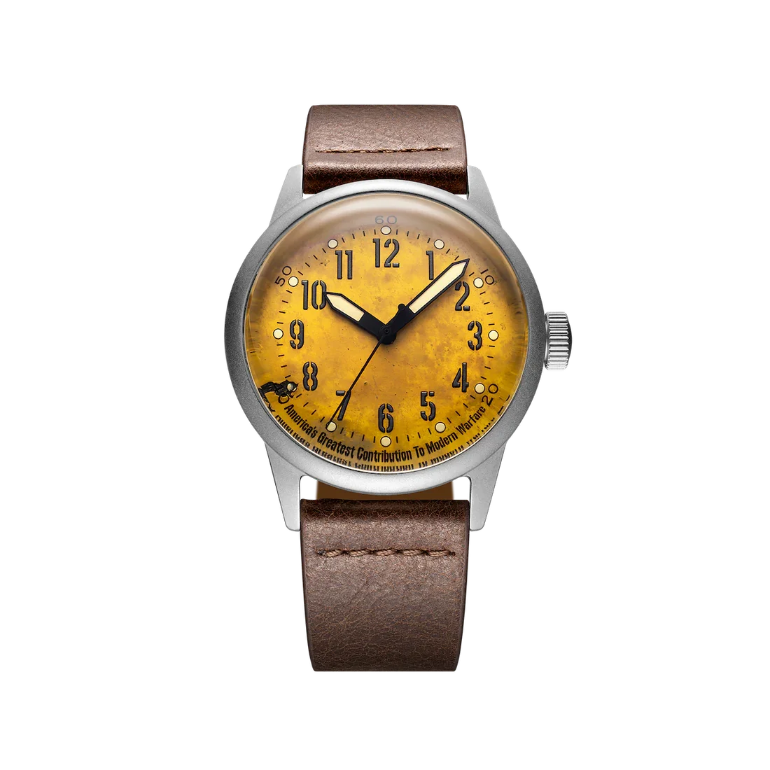 Silver watch with distressed yellow dial, black Arabic numerals & luminous hands, and brown leather strap. Text reads