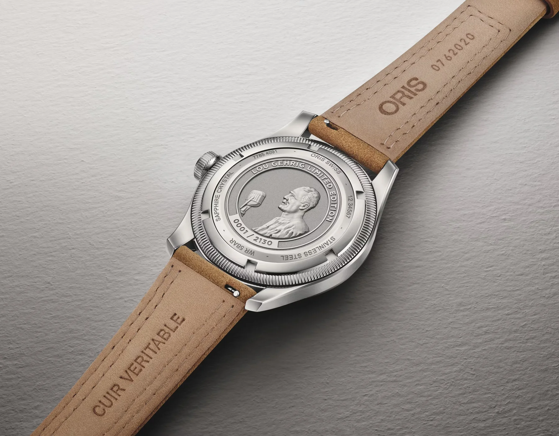 Rear of Oris Lou Gehrig Limited Edition watch. Tan leather strap. Caseback engraved with Gehrig's profile, bat, 0001/2130.