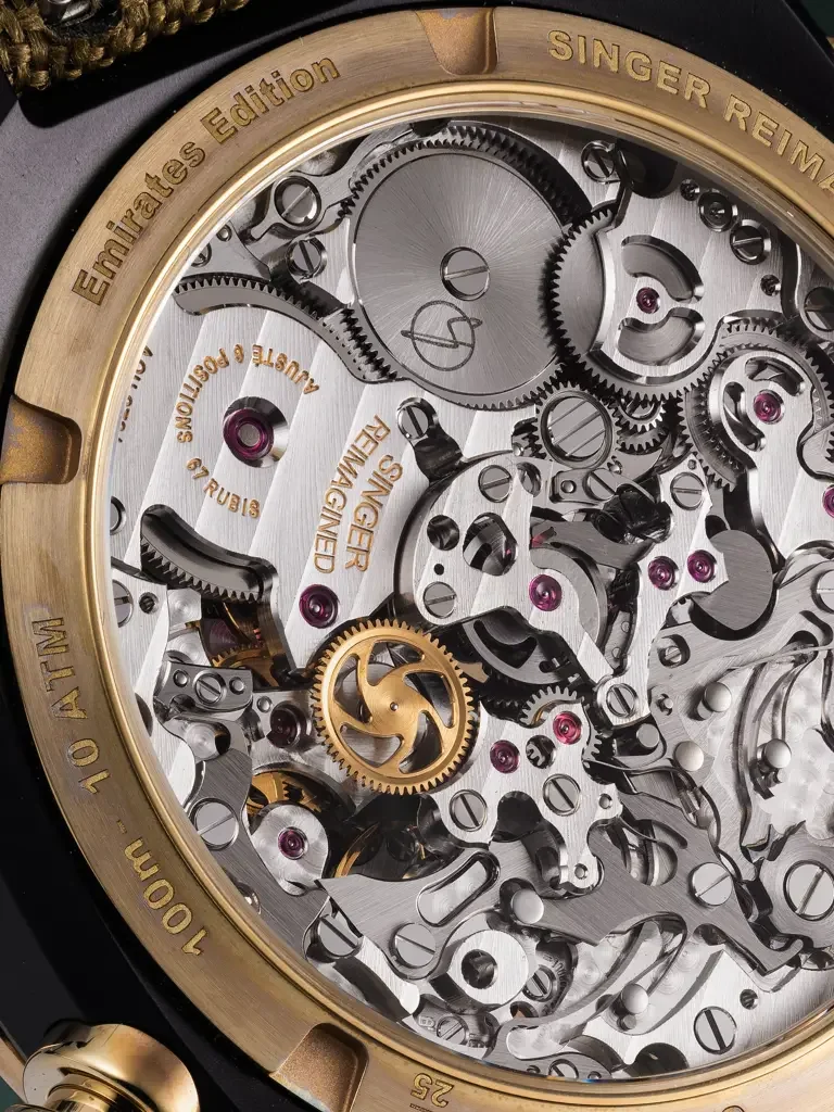 Singer Reimagined Track 1 Emirates Edition watch movement. Intricate gears, ruby jewels, engraved details.
