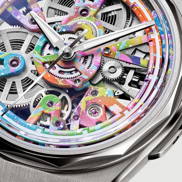 Close-up of a luxury skeleton watch, vibrant, colorful paint-splattered movement, silver hands, and brushed steel case.