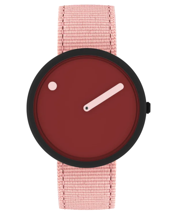 Minimalist watch with dark red dial, black case, light pink single hand & dot, light pink woven strap.