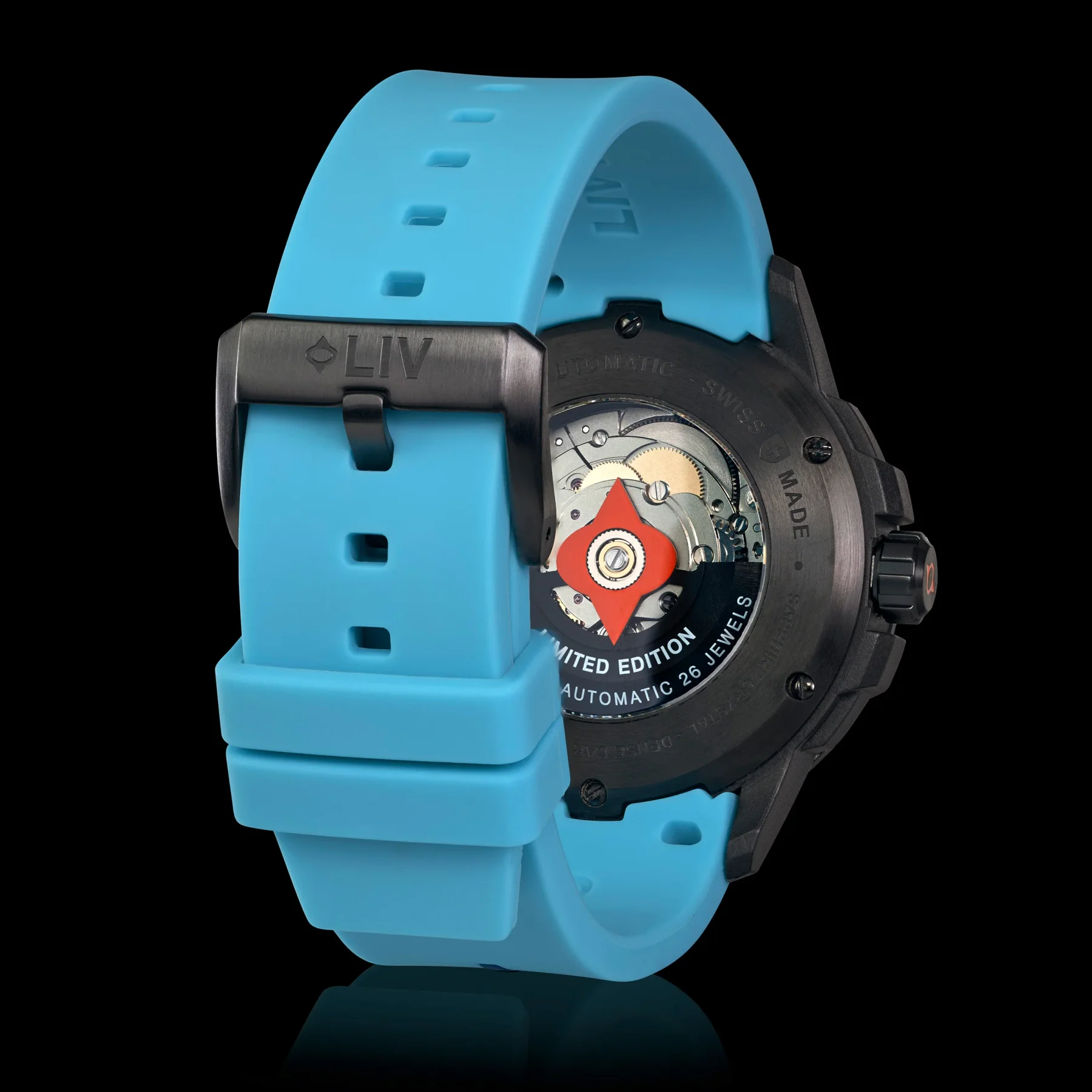 Rear view of a LIV automatic luxury watch. Light blue silicone strap, black case, visible Swiss movement & red rotor.