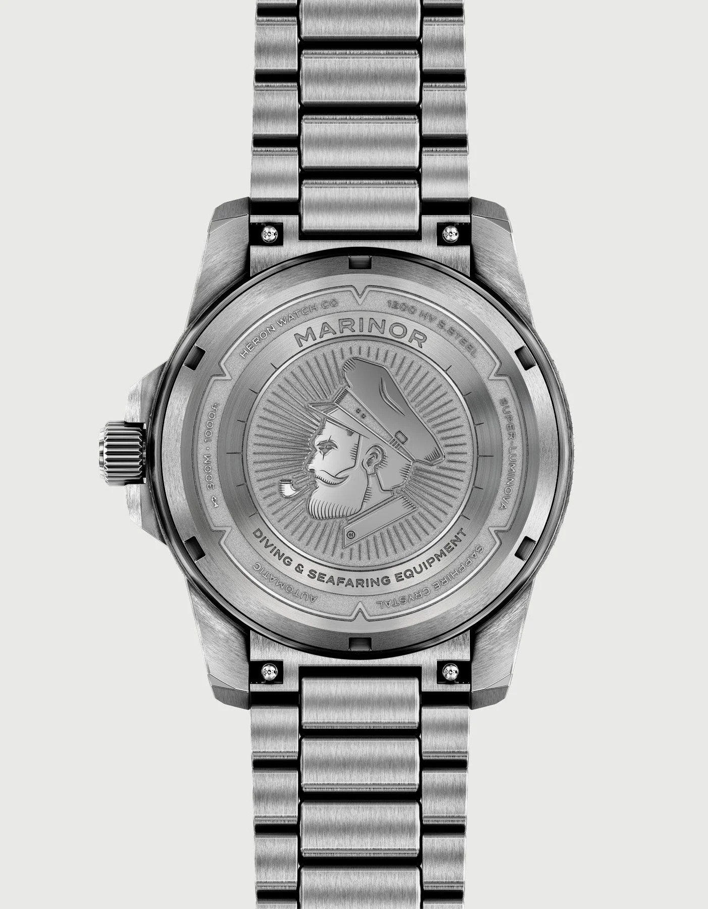 Brushed steel Heron Marinor watch case back with engraved captain, 'Diving & Seafaring Equipment' text, metal bracelet.