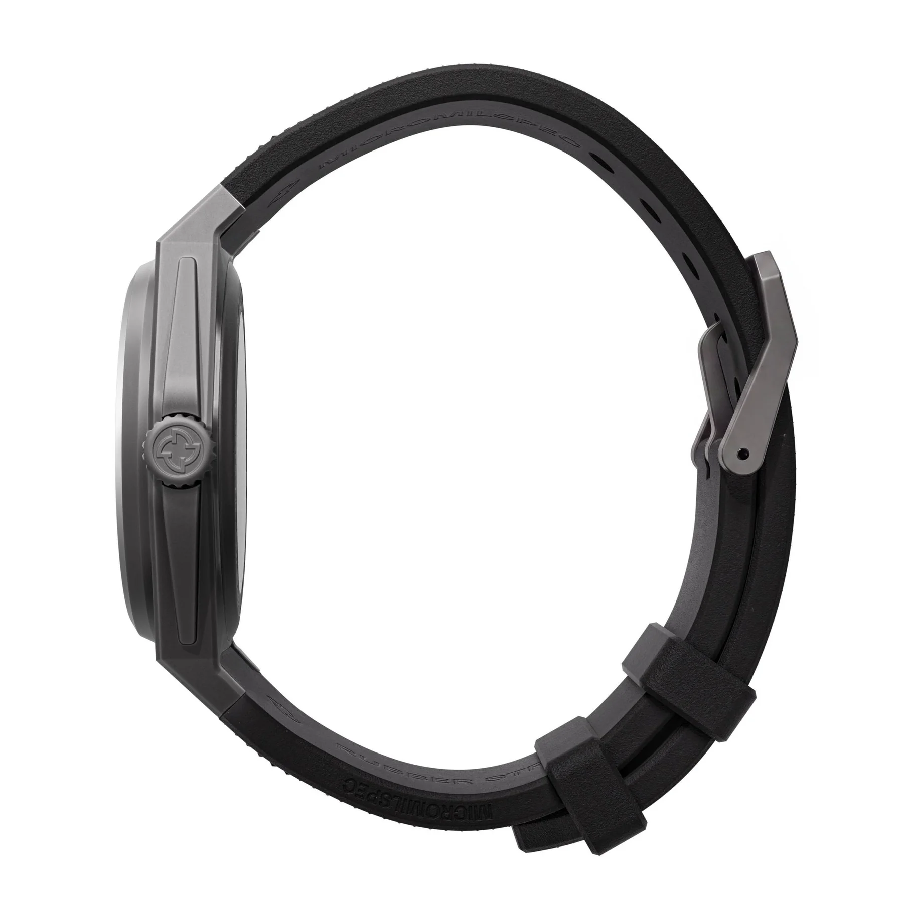 Side view of a grey luxury watch with logoed crown, textured black rubber strap ('MICROMILSPEC'), and grey clasp.