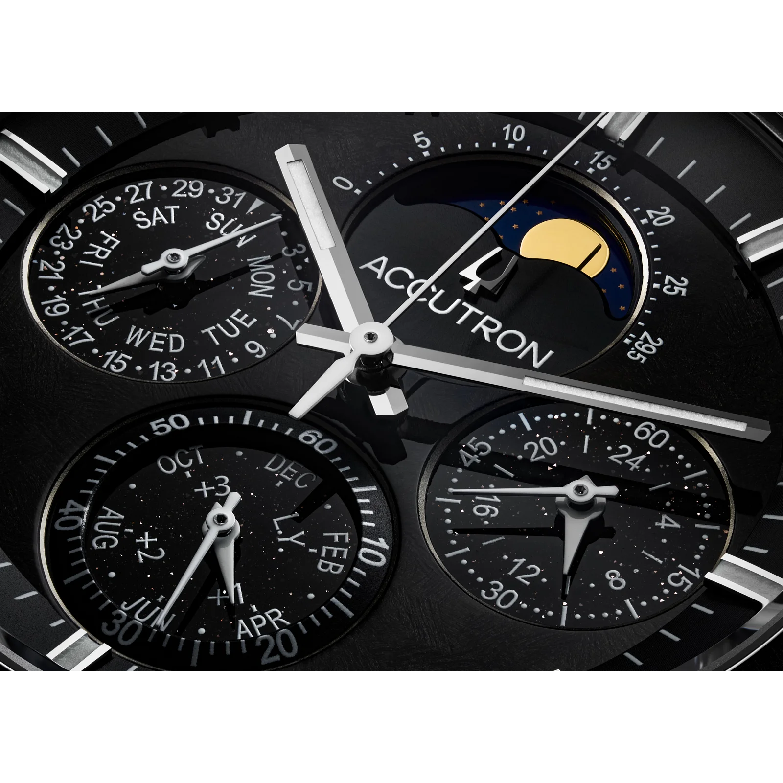 Accutron watch dial with moon phase, day, date, month, and 24-hour sub-dials on a dark, starry background.