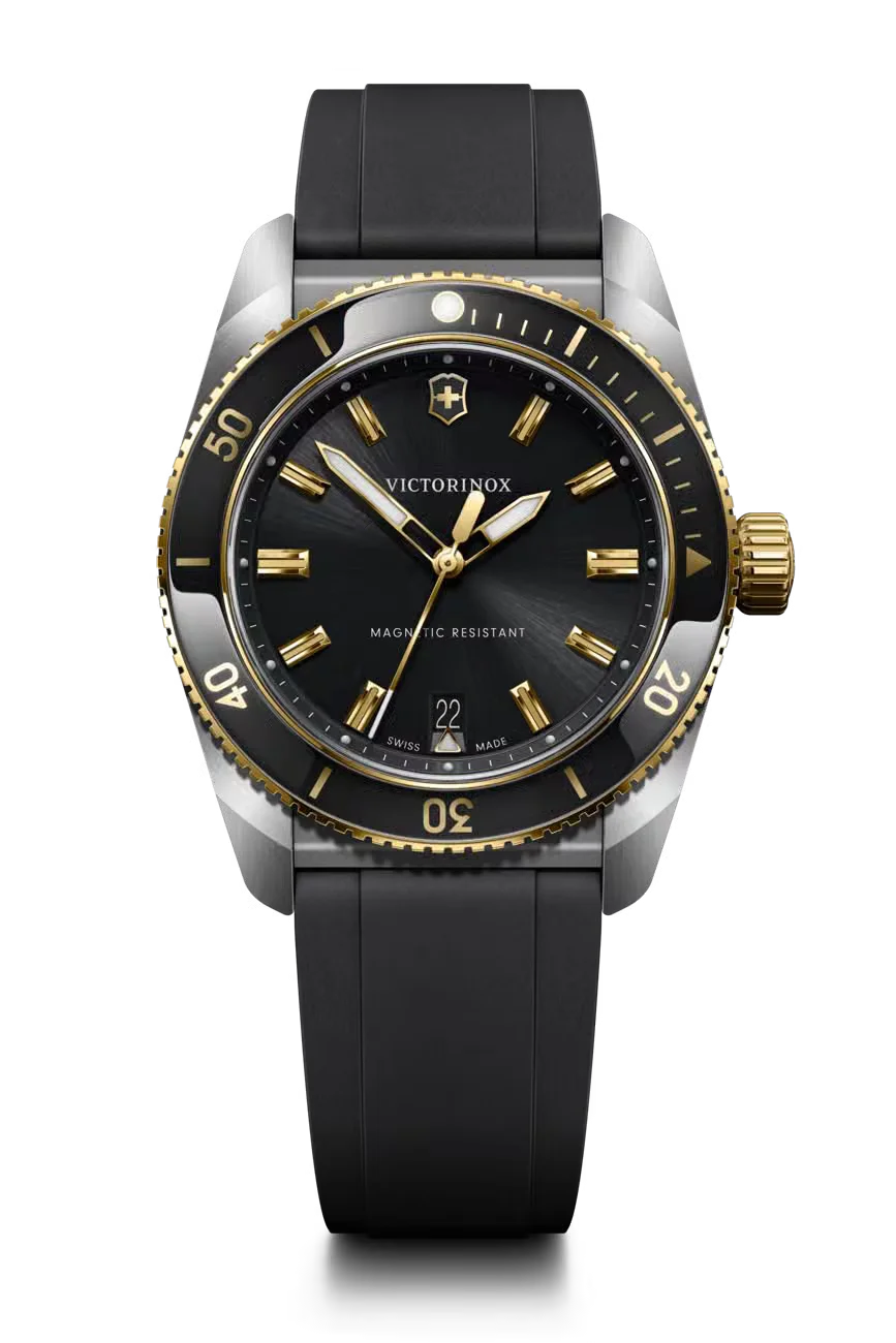 Victorinox dive watch: steel case, black rubber strap, black sunray dial, gold-tone hands/markers, black & gold rotating bezel.