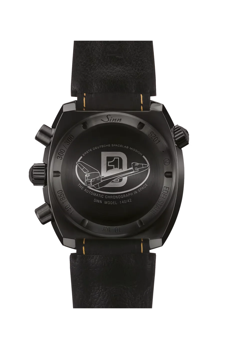 Rear view of black Sinn chronograph watch. Engraved 'Spacelab Mission' text, rocket graphic, 300/300 limited edition. Black leather strap.