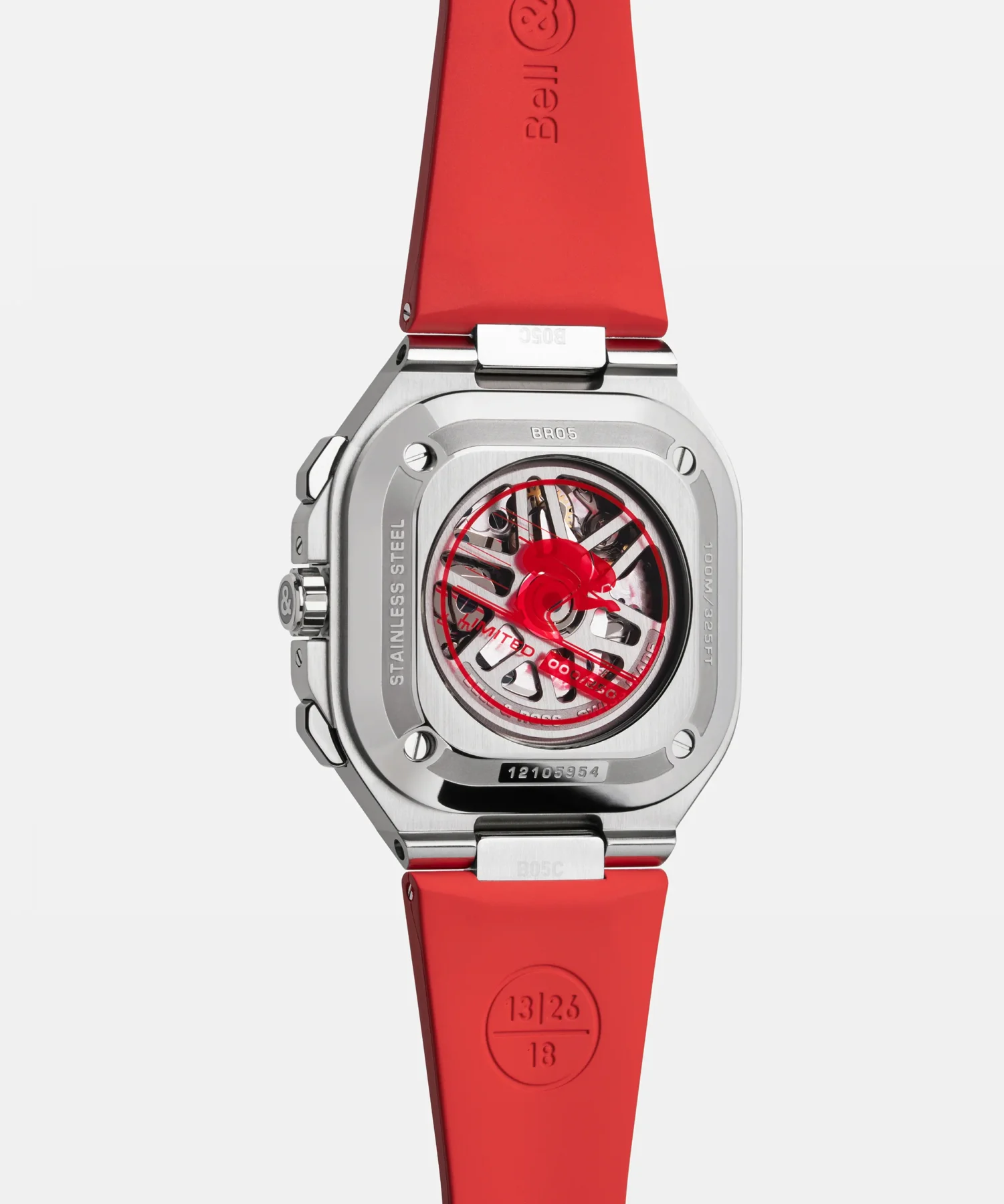 Back of a Bell & Ross BR 05 stainless steel watch, red rubber strap. Exhibition caseback shows red rotor, "13/25" visible.