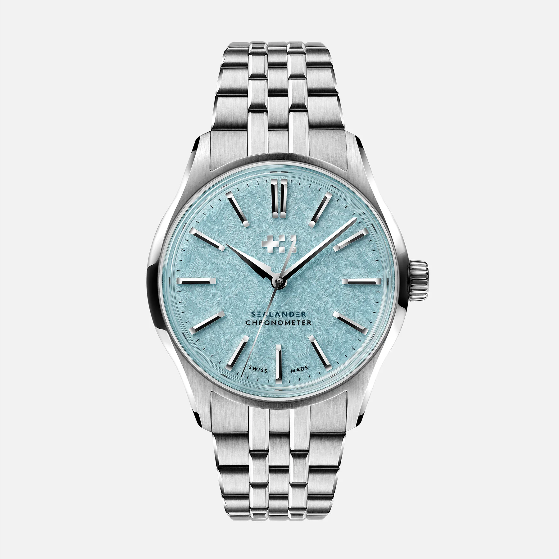 Luxury steel watch with frosty light blue dial, applied indices, "SEALANDER CHRONOMETER" text, and steel bracelet.