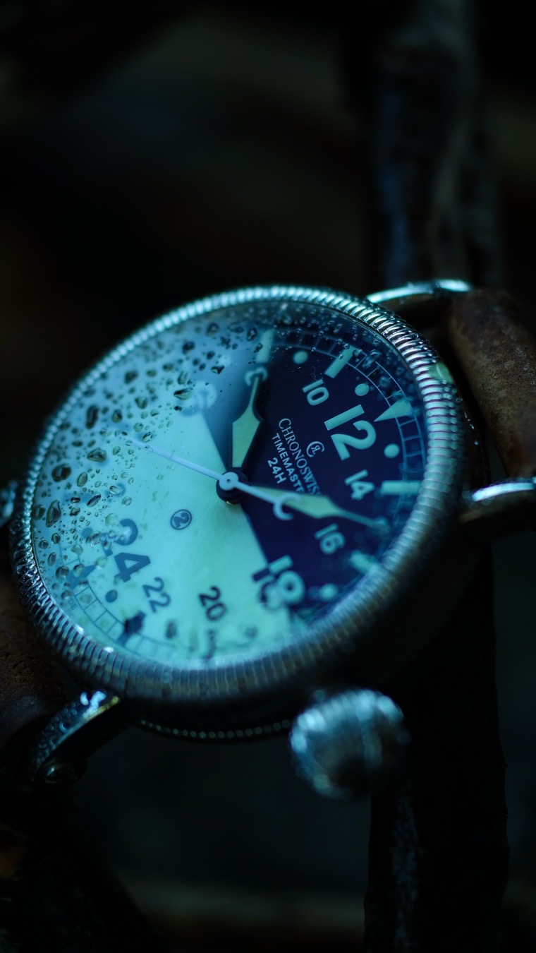 The Chronoswiss Timemaster is a masterclass in how a watchmaker’s private passions can rewrite modern design rules. When Lang launched the Timemaster, he didn’t look at what was trending in the jewelry windows; he looked inside his own garage and his legendary private collection of horological artifacts.
The Timemaster became a mechanical bridge connecting three distinct worlds that Lang lived and breathed.

1. The muse for the Timemaster was the 1942 Minerva military chronograph from his personal archive.
* Pilots in unheated WWII cockpits wore thick leather gloves and couldn’t fiddle with tiny crowns. Lang replicated Minerva’s massive, ribbed “onion” crown so modern owners could feel that exact same tactile, industrial grip.
* He didn’t just copy the crown; he copied the way it was mounted on an extended stem or “stilt,” keeping the massive crown from digging into the wrist.

2. Lang was a fixture in the European classic car rally circuit, often piloting his beloved vintage Jaguar XK120. He realized that delicate luxury watches were utterly useless when bouncing around a vibrating cockpit at high speeds.
* He designed the Timemaster dial to mimic 1950s automotive dashboard clocks like the Heuer Autavia and Bordmaster.
* The coin-edged rotating bezel with its single, prominent luminous marker was pulled straight from vintage rally timers, allowing co-drivers to count down exact seconds during precision trials.

3. Before founding Chronoswiss, Lang spent years working for Heuer during the golden era of motorsport timing. He even served on the timing crew for Steve McQueen’s legendary film Le Mans.
* His time at Heuer instilled a deep love for oversized, mechanical handheld stopwatches. When the rest of the watch world was shrinking timepieces down, Lang went huge. He stuffed large-caliber pocket watch movements into the Timemaster to evoke the mechanical “thump” of a racing timer.
The Timemaster isn’t just a sports watch; it was Lang’s personal love letter to the era of analog speed, built because he wanted a watch that felt as mechanical and uncompromising as the classic machines he raced.
#germanwatch #chronoswiss #moodywatchshots #watchgeek #watchoftheday