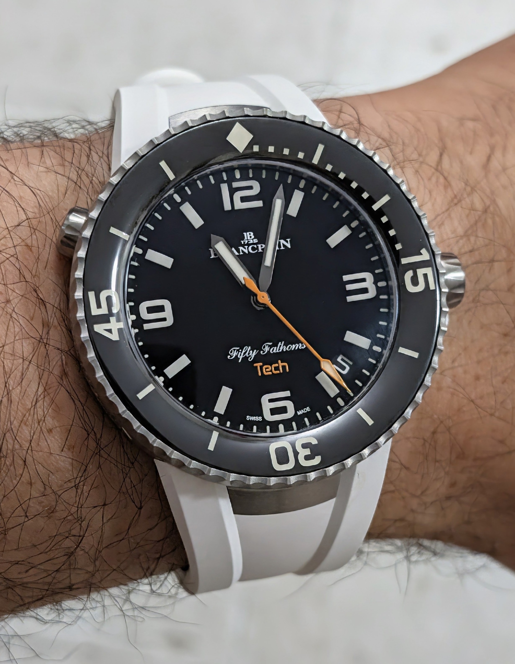 Blancpain Fifty Fathoms Tech on a white strap.
