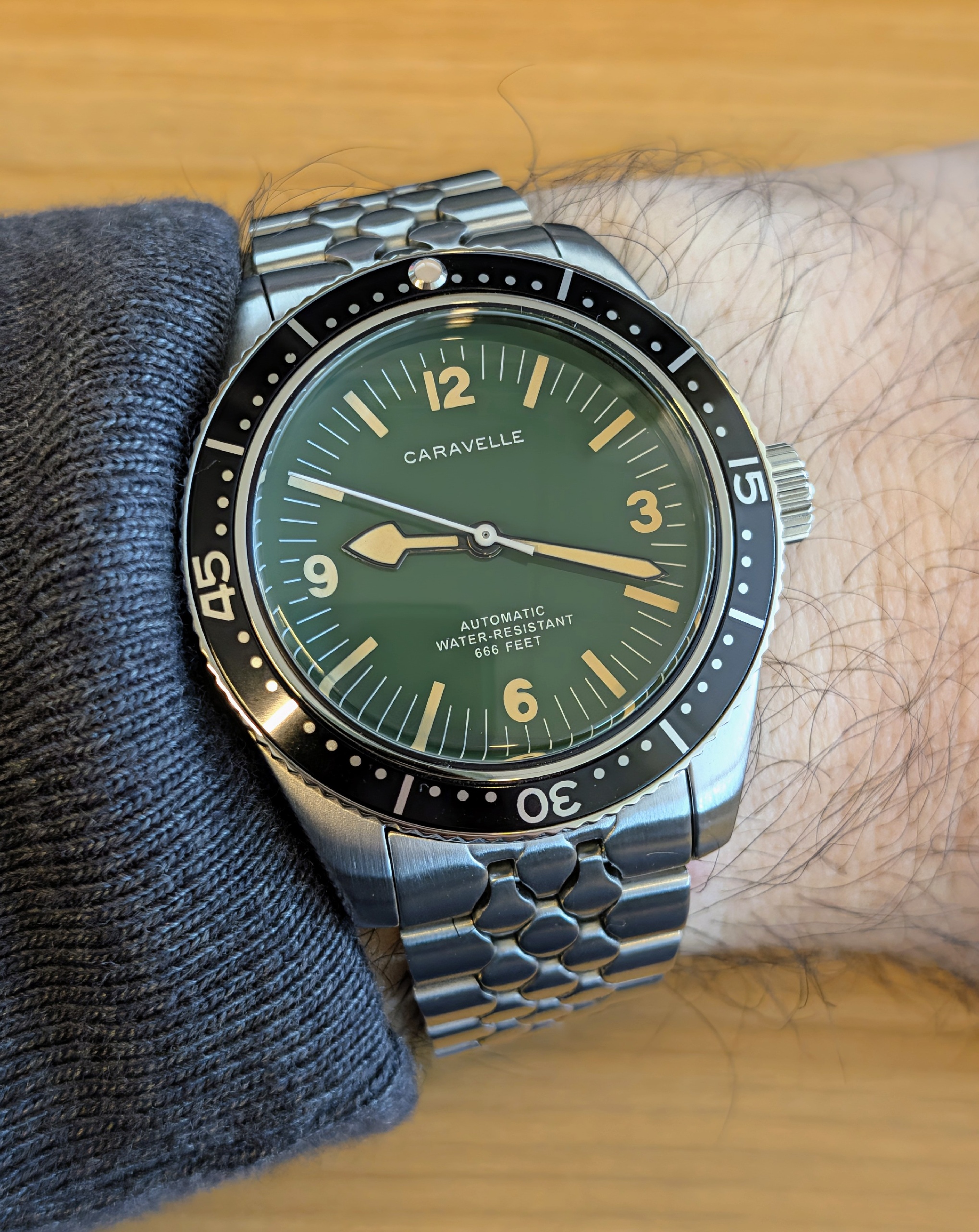 Caravelle Sea Hunter x Windup Watch Shop Limited Edition on a snakeskin bracelet by Uncle Straps.