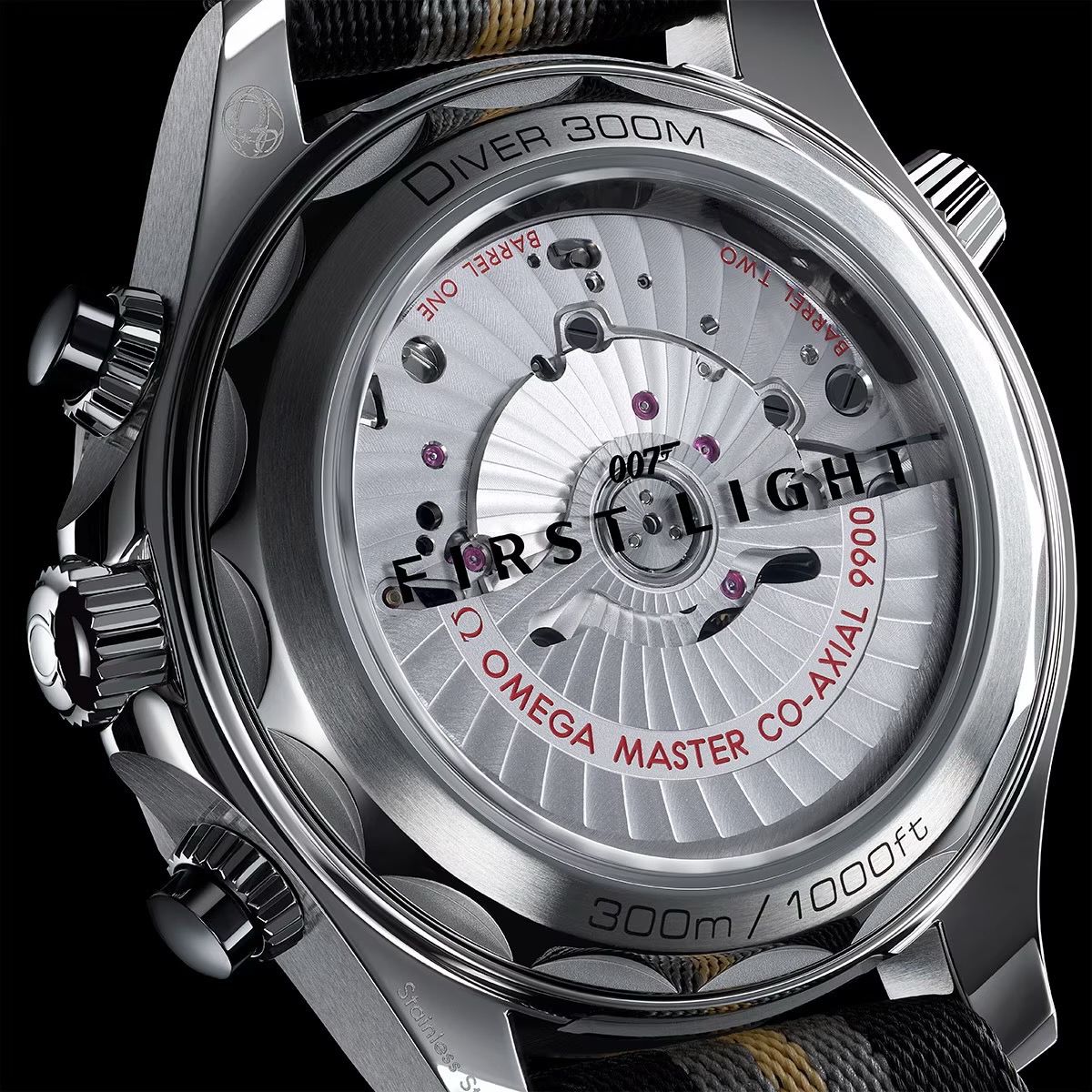 Transparent back of Omega Seamaster 007 "First Light" showing Co-Axial movement, "FIRST LIGHT" rotor & 300m rating.