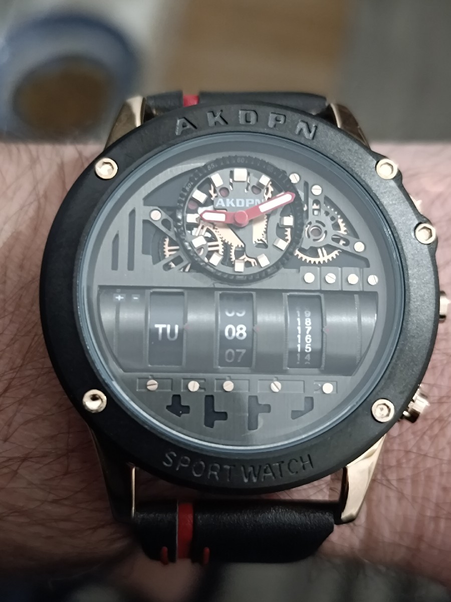 AKDPN watch. A Chinese watch that's actually not bad. Good style, good weight, different, hard to set up though but if you follow the instructions it's ok. Naviforce strap. Overall I'm quite impressed. 
Cons: Sport watch and show style written on the watch. I don't understand why they do that. 