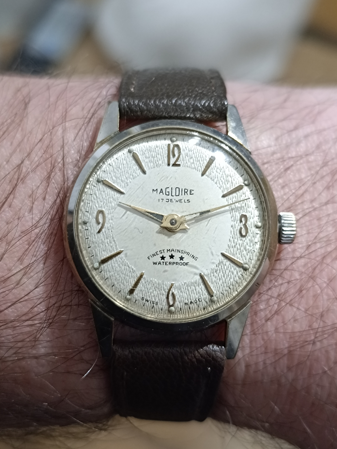 This vintage Magloire 17 jewels, swiss made , waterproof (I doubt) , finest mainspring (yeah, so fine that it was broken) , anti-magnetic (maybe) , case back 3114177
It's definitely a beautiful piece. I just wish antique watches were a little bigger the case size. 
