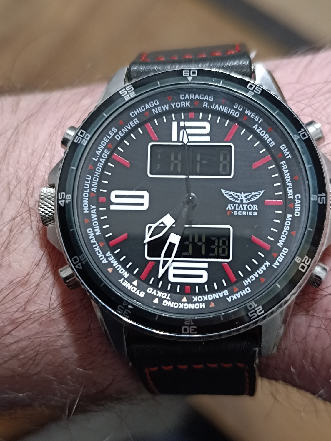 A fantastic watch in my opinion - Aviator F-series chronograph watch -  rotating internal GMT bezel - digital and analogue display. 
It offers more than the majority of brands for the money! 