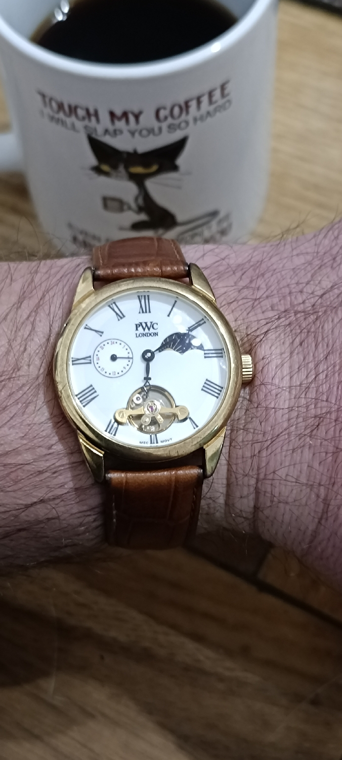 PWC London wristwatch - wristcheck done + caffeine uploading + cat fed 
Coffee first. Questions later ☕😅
PWC London getting some wrist time this morning — simple, elegant, and quietly charming.
Budget friendly mechanical watch