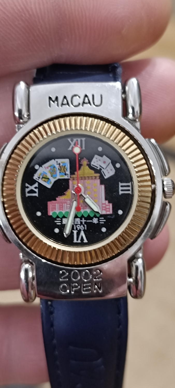 2002 Macau Memorial Flip-Open Casino Watch - Dice Games - Playing Card  
This item is a collectible, a souvenir, an item to remind you of your visit to Macau! 
It's playful, a conversation starter! It's fun to have it. What about you? Are you a player? Are you a lucky one? 
