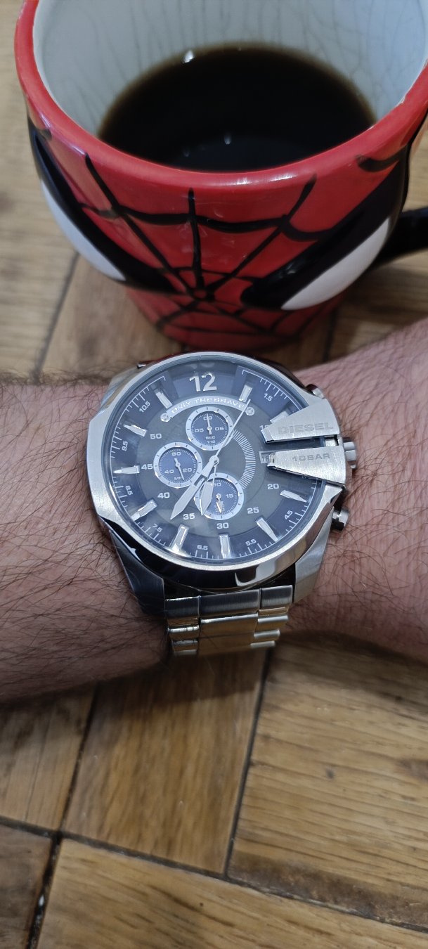Starting the morning right with some caffeine and bold style. Taking a quick look at the massive presence of the Diesel Mega Chief Chronograph (10BAR) on the wrist. That signature crown guard never gets old.
What’s on your wrist today? Let me know in the comments!
Check out more watch content over at @arbalexwatches.
#DieselWatch #WristRoll #Chronograph #WatchCollector