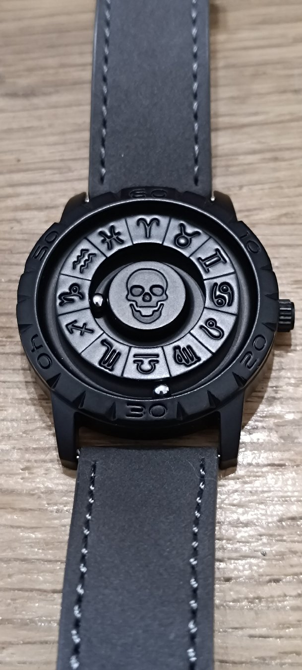 Morning,
Today we’re checking out the FOXBOX FB0047—a stealth-black watch that trades traditional hands for magnetic ball bearings! Originally invented so visually impaired users could feel the time without damaging fragile gears, this cool mechanism lets the metal spheres snap back into place with a flick of the wrist. Wrapped in a striking skull and zodiac dial, it’s one of the most unique budget pieces on the channel.

​What do you think of magnetic timepieces? Let me know in the comments!

​Don't forget to like, comment, and subscribe for daily watch reviews, teardowns, and horological content!


#watch #watches #watchtok #watchcommunity #budgetwatch #watchfacts #horology #watchreview #foxbox #magneticwatch
