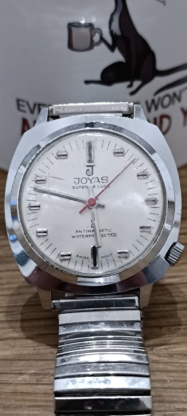 Morning
Today we take a closer look at this vintage 1970s Swiss-made Joyas Super De Luxe mechanical watch! This classic manual-wind timepiece features a distinctive retro cushion-shaped chrome case, a clean silver-white dial, and an authentic expandable vintage metal stretch band. The screw-down case back is marked "Base Metal Case, Stainless Steel Back, Dustproof" alongside the original model reference number 1004. A beautiful survivor from the golden era of affordable Swiss horology.
#VintageWatch #JoyasWatch #SwissMade #70sStyle #MechanicalWatch