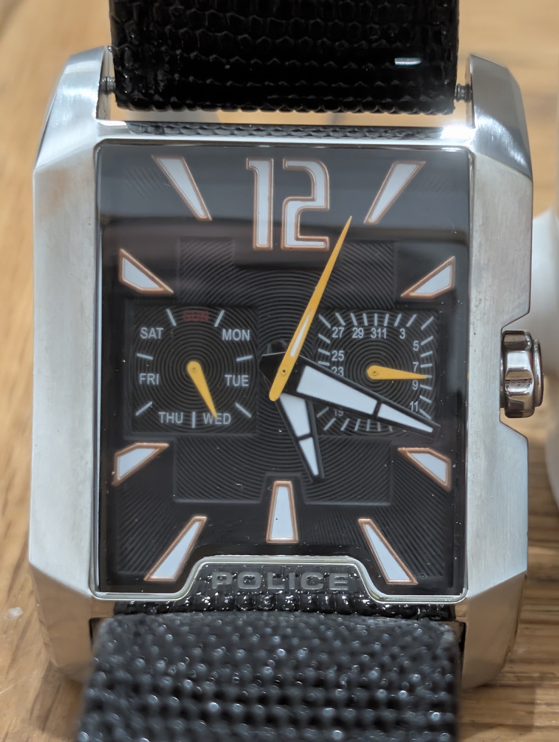 Morning everyone
Taking a look back at a total mid-2000s fashion icon: the Police 11663M.
Love them or hate them, the watch designs from this era were completely unapologetic. With an angular rectangular steel case, bold orange hands, day/date subdials, and a massive 26mm strap width, this piece makes a serious statement on the wrist.
What do you think—does the chunky Y2K design language hold up today, or should it stay in the past? Drop your thoughts in the comments!
Quick Specs:
Model: Police 11663M
Case: Rectangular / Tonneau Stainless Steel
Complications: Day & Date Subdials
Strap Width: 26mm
Water Resistance: 5 ATM / 50m