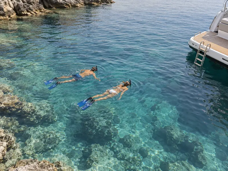 Serene bay snorkelling by yacht
