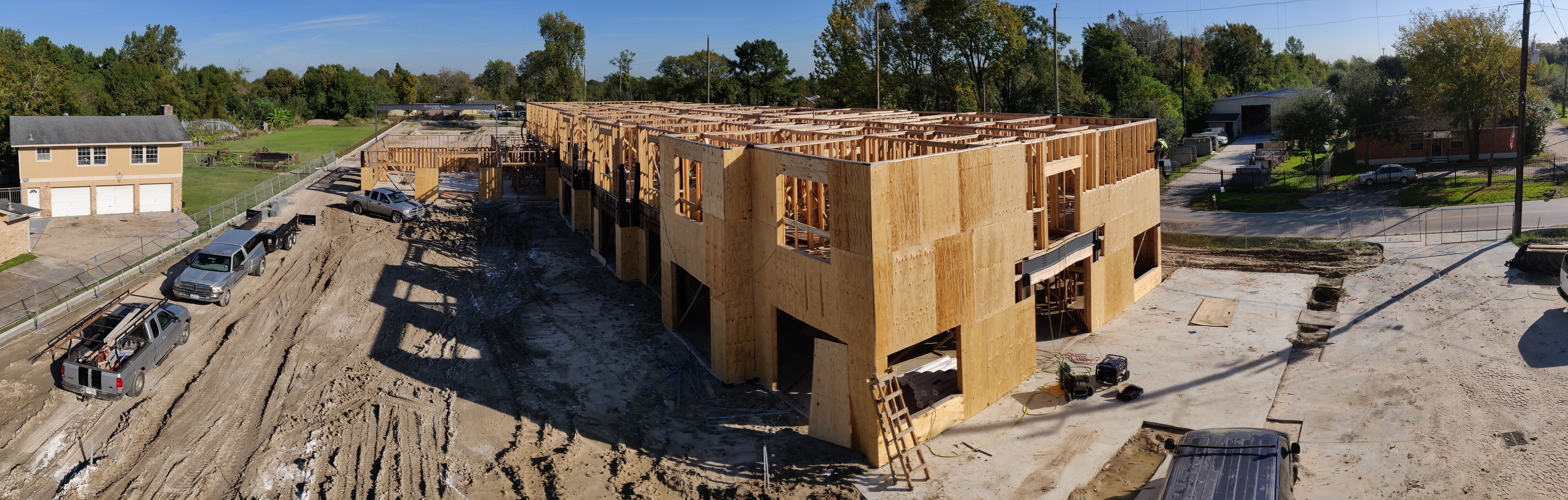 VeraBuilt's commitment to its mission, represented by an overlay on a construction work image
