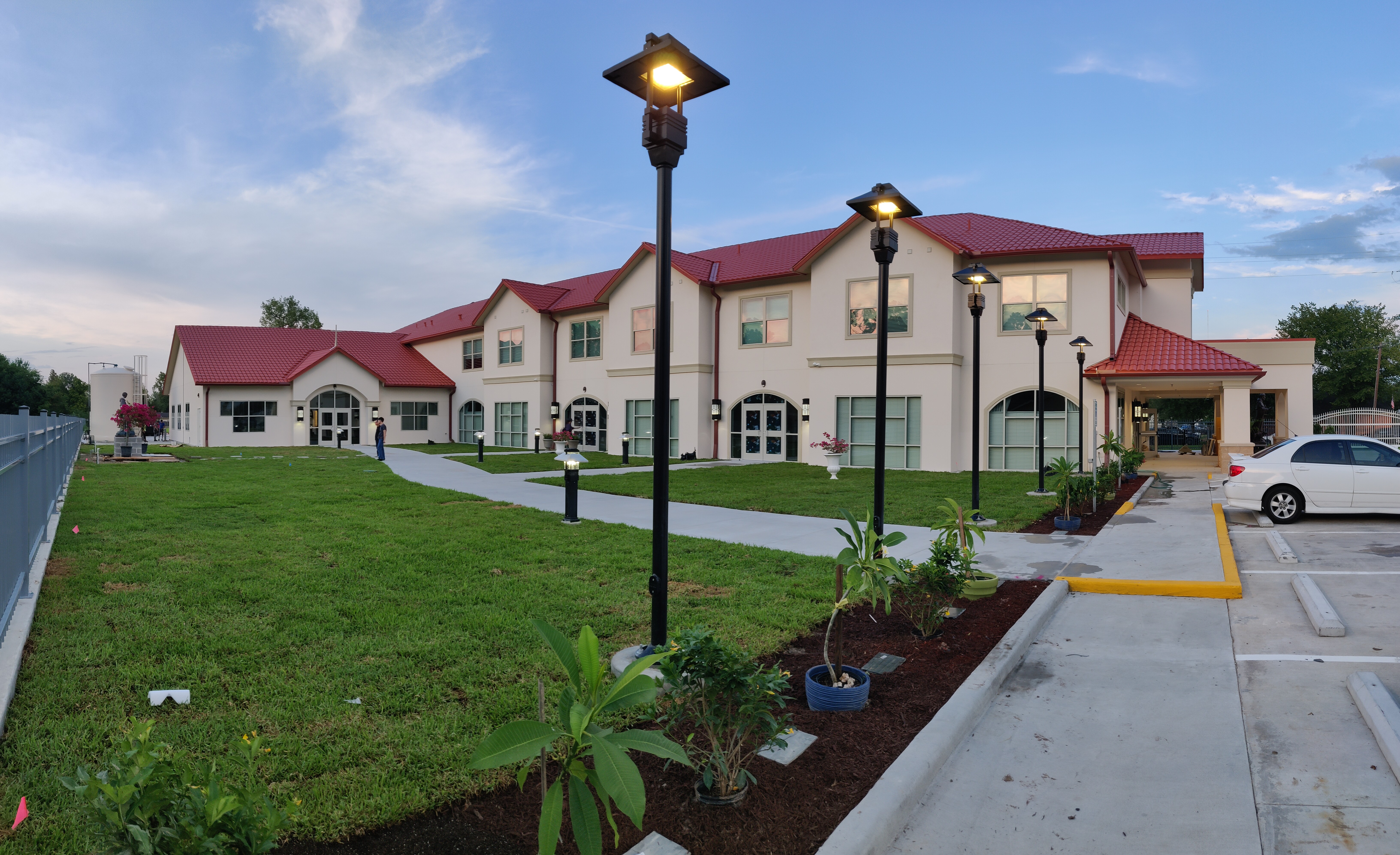 Left side view of modern building from parking