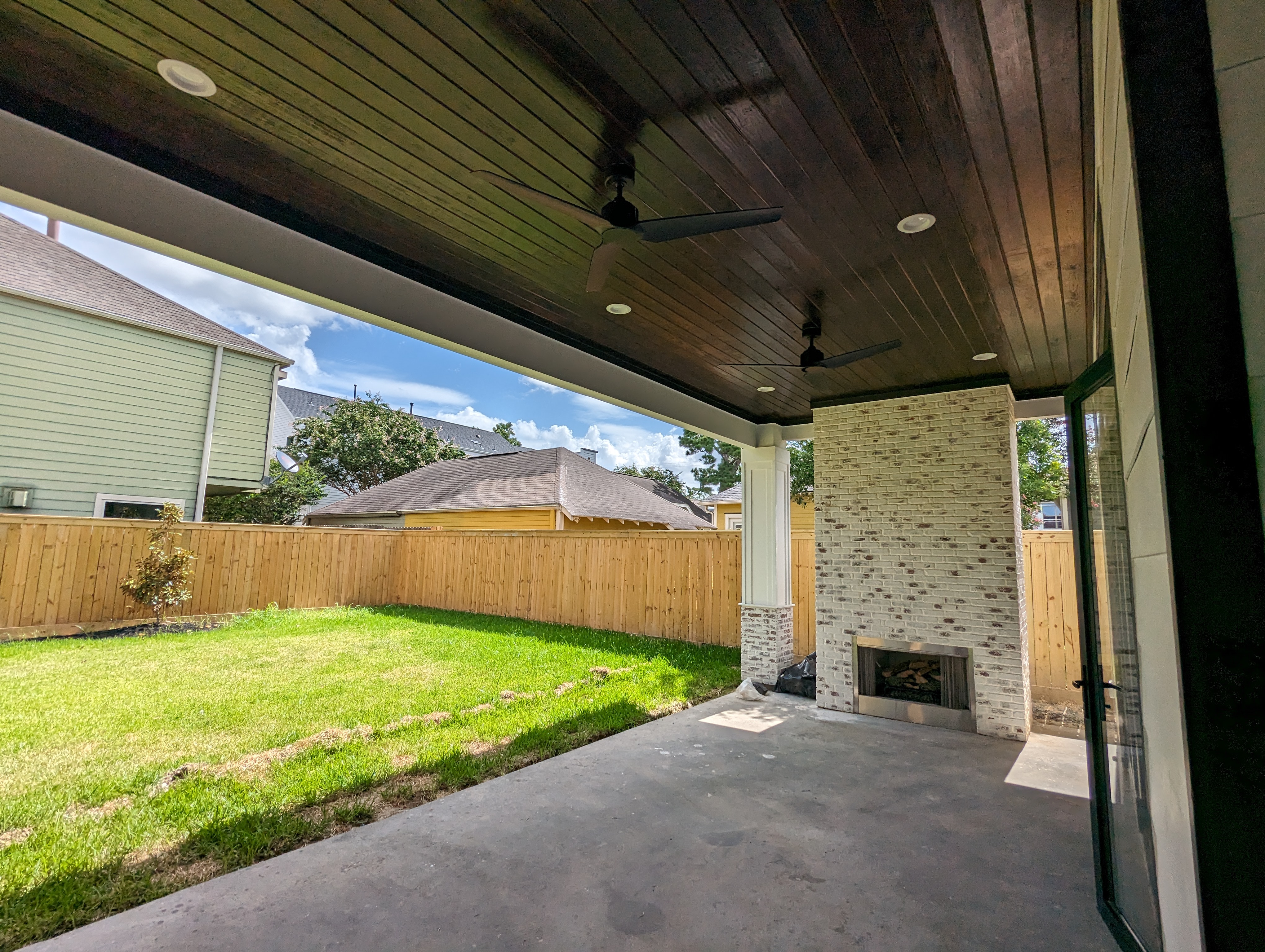 Back porch with outdoor fireplace
