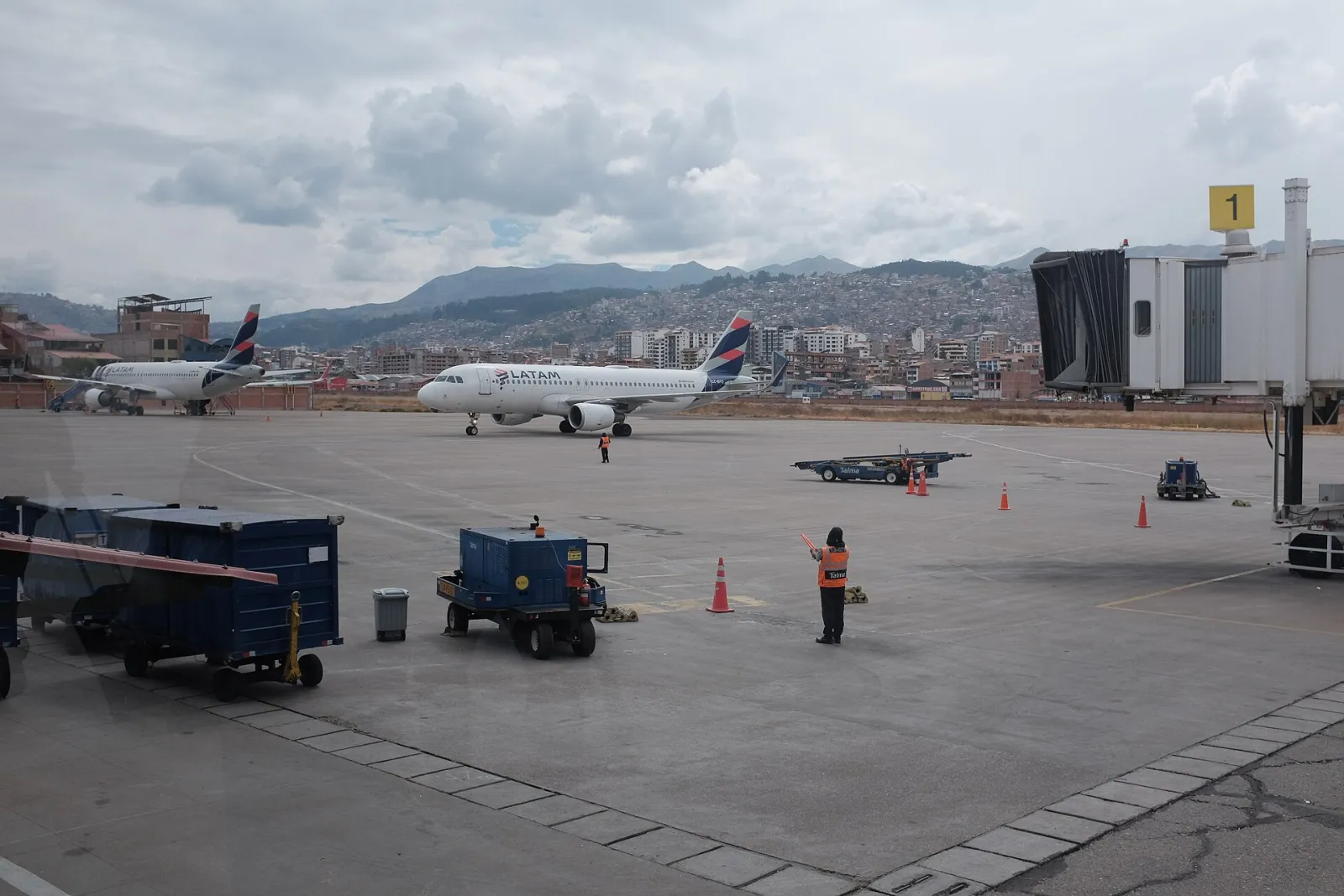 The apron of Cusco's Alejandro Velasco Astete airport with mountains behind