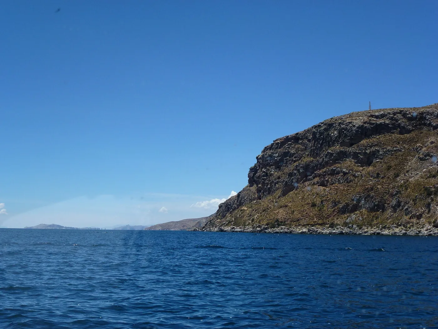 Terraced hillsides and stone paths on Taquile Island in Lake Titicaca