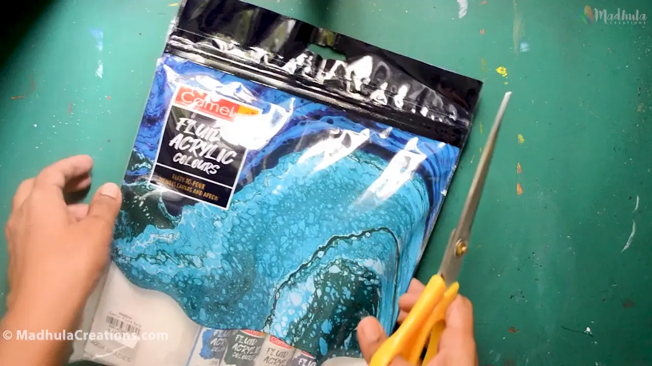 Preparing the workspace for acrylic pouring