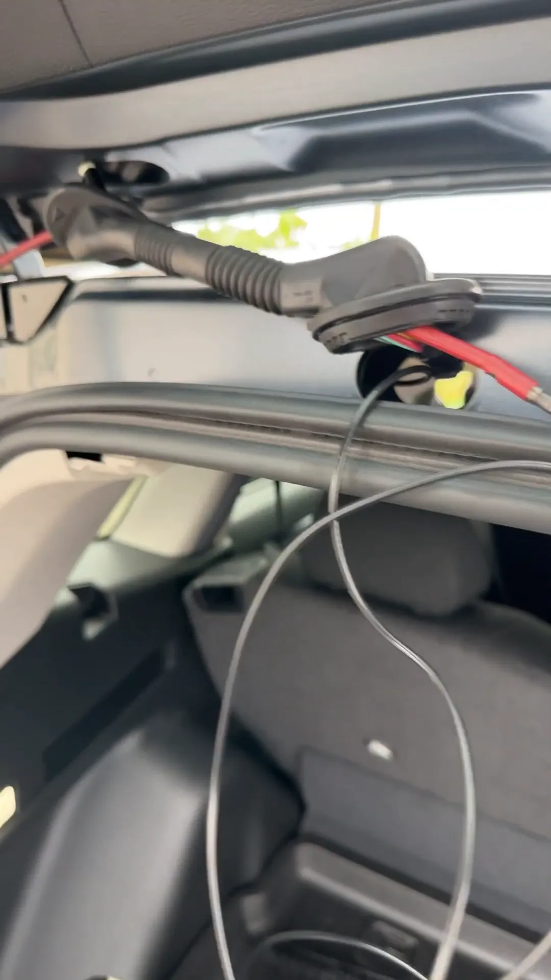 Using a wire fish tool to run the wiring.