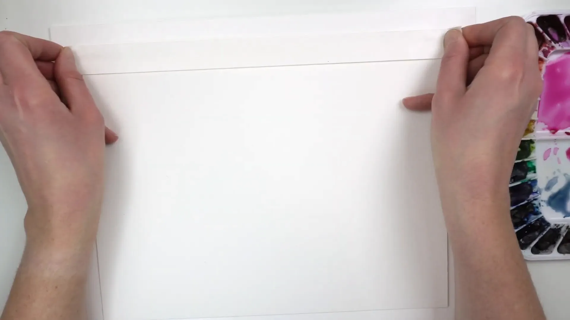 Taping down watercolor paper