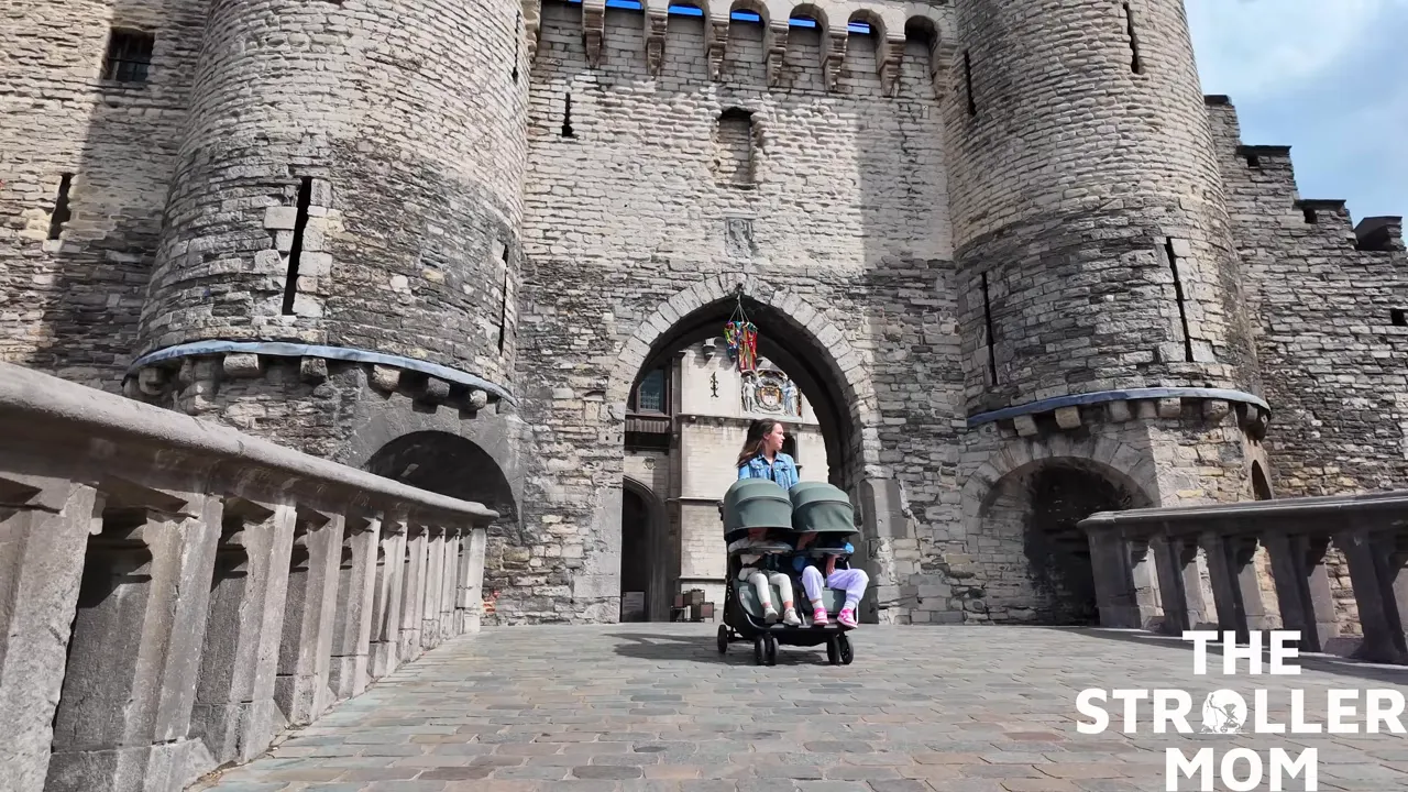 Zoe Twin V3 in Europe near a castle with two kids in the seat