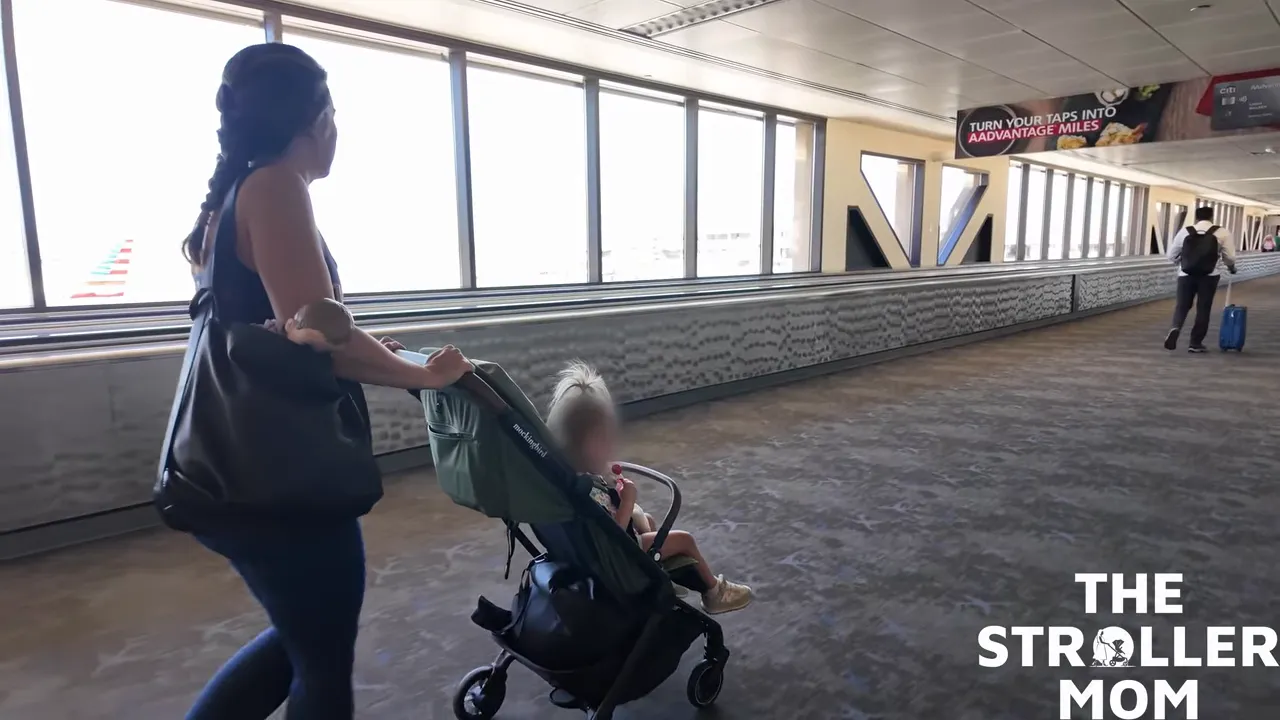 Pushing the Mockingbird Travel Stroller through the airport