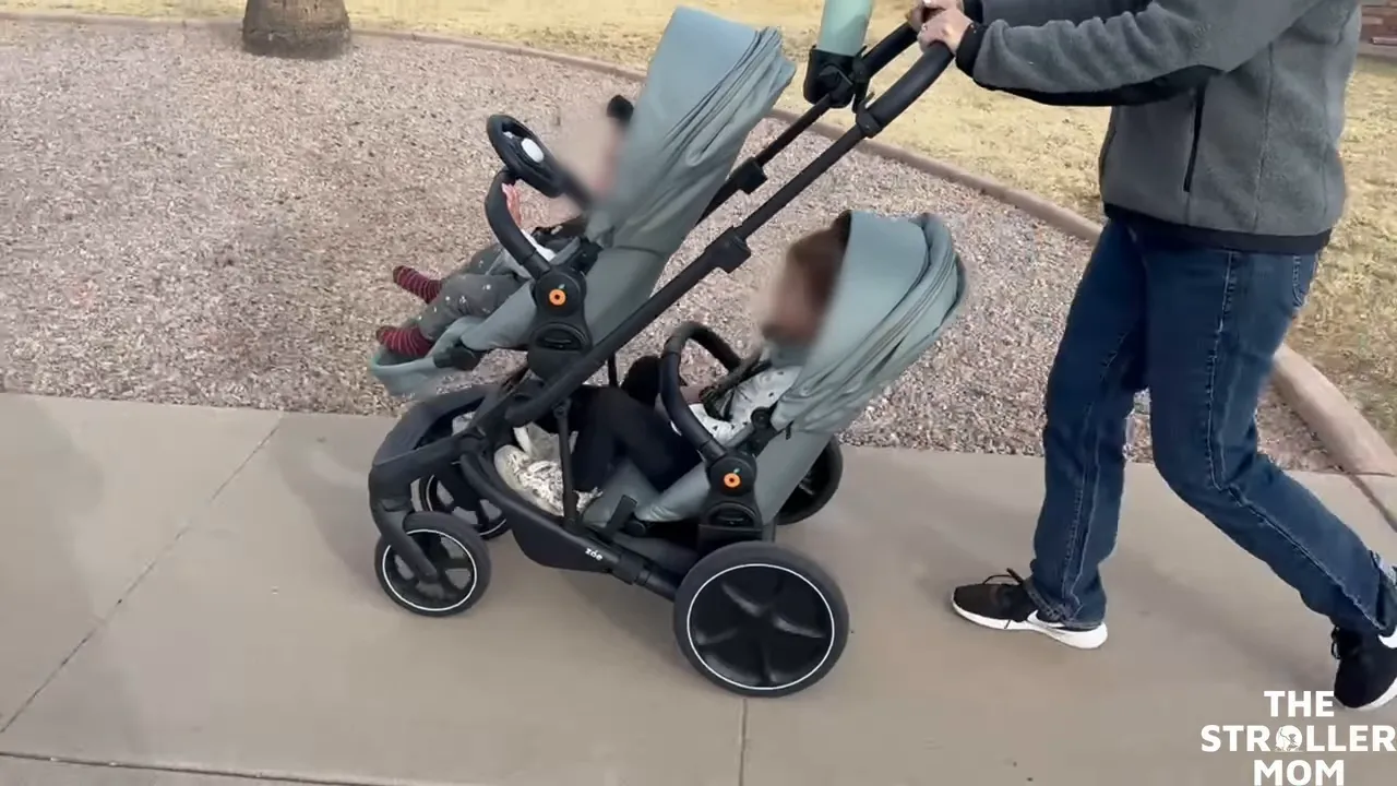 Zoe Journey single to double stroller with front and rear seats stacked inline