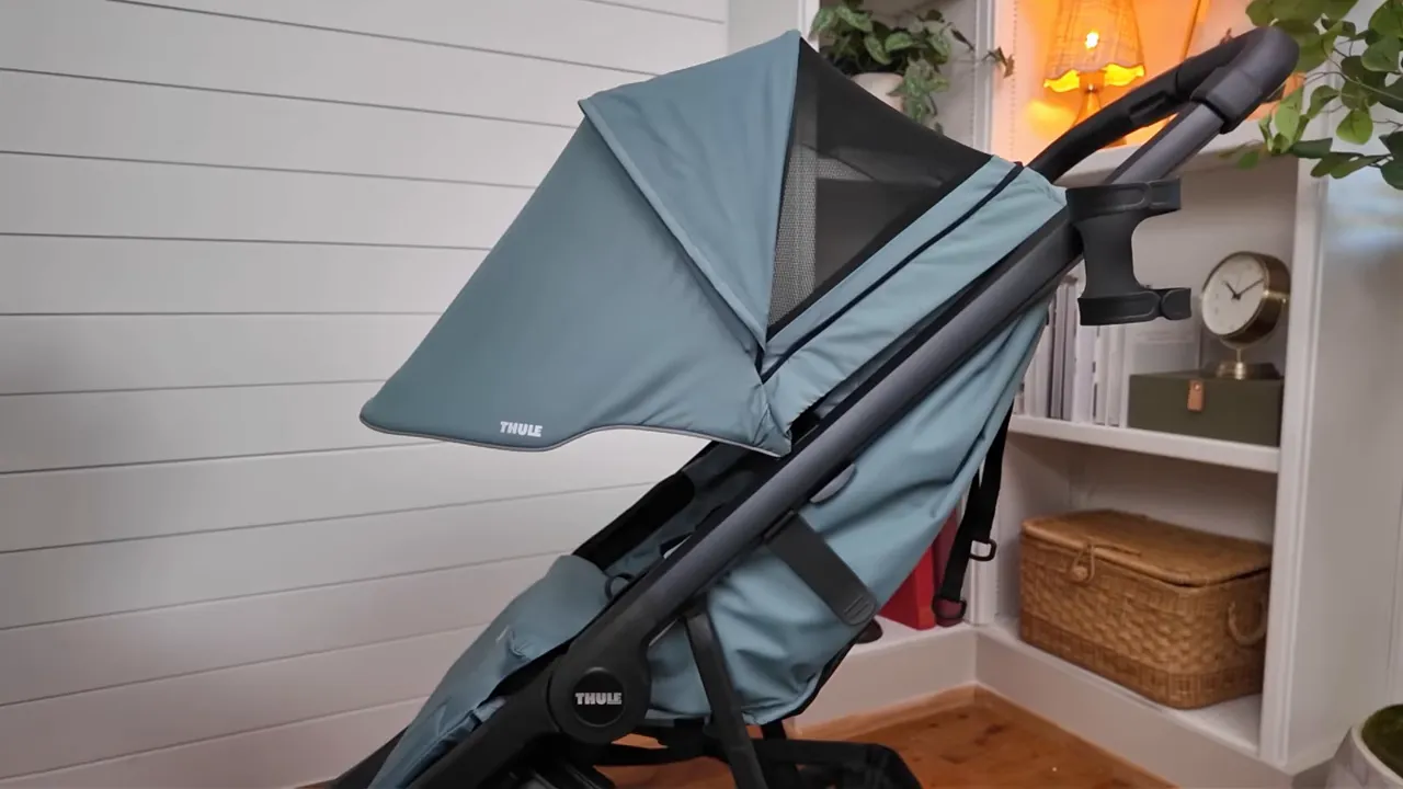 Thule Spring 2 canopy side view with zipper extension and peekaboo window