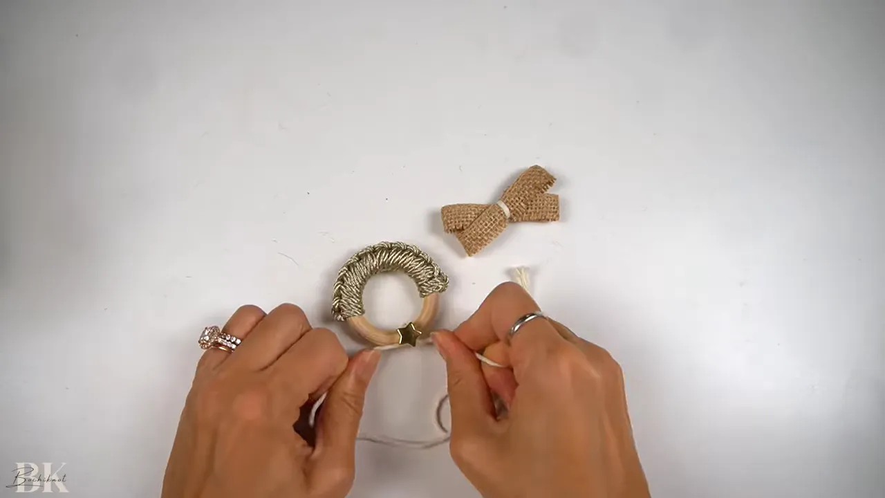 Threading string through the star bead