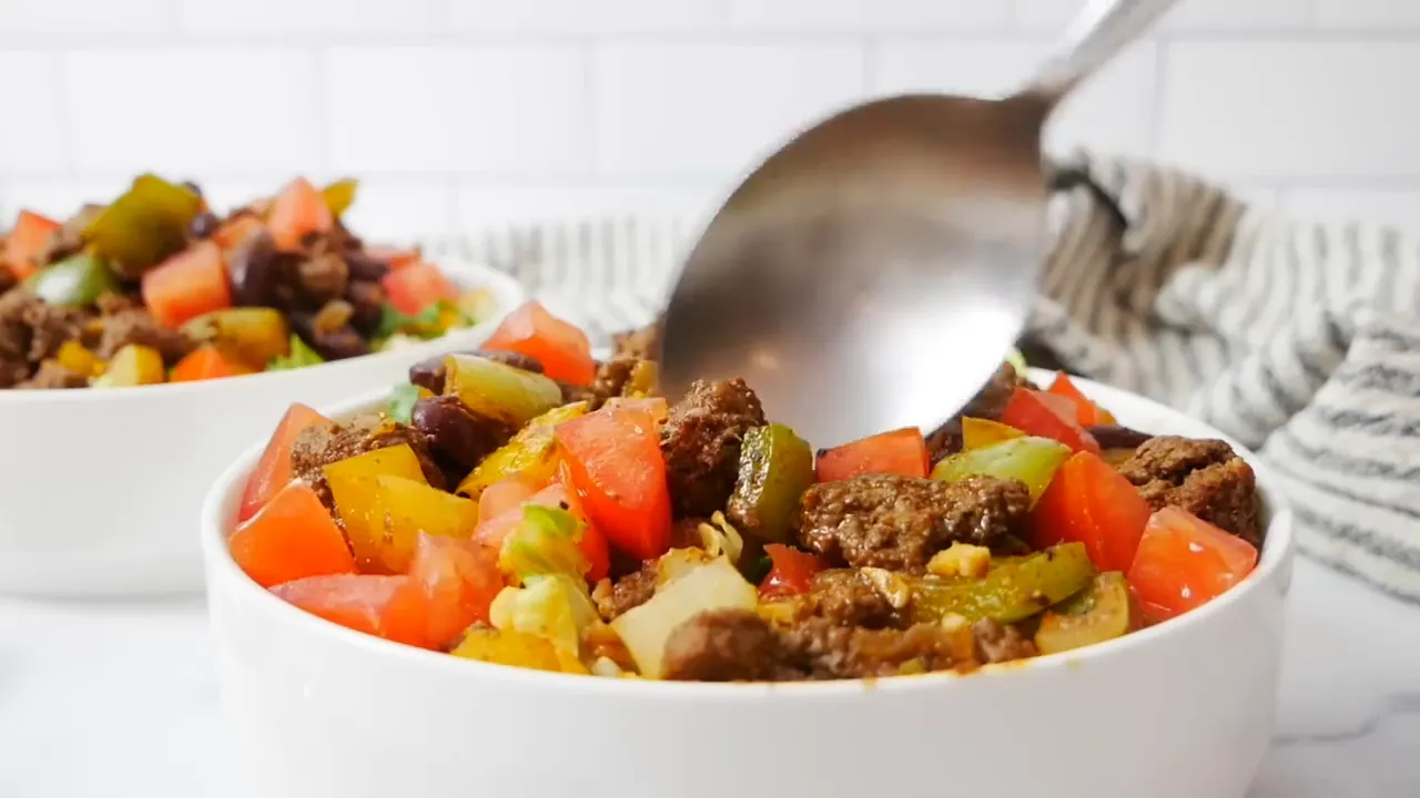 Final toppings on taco salad bowl
