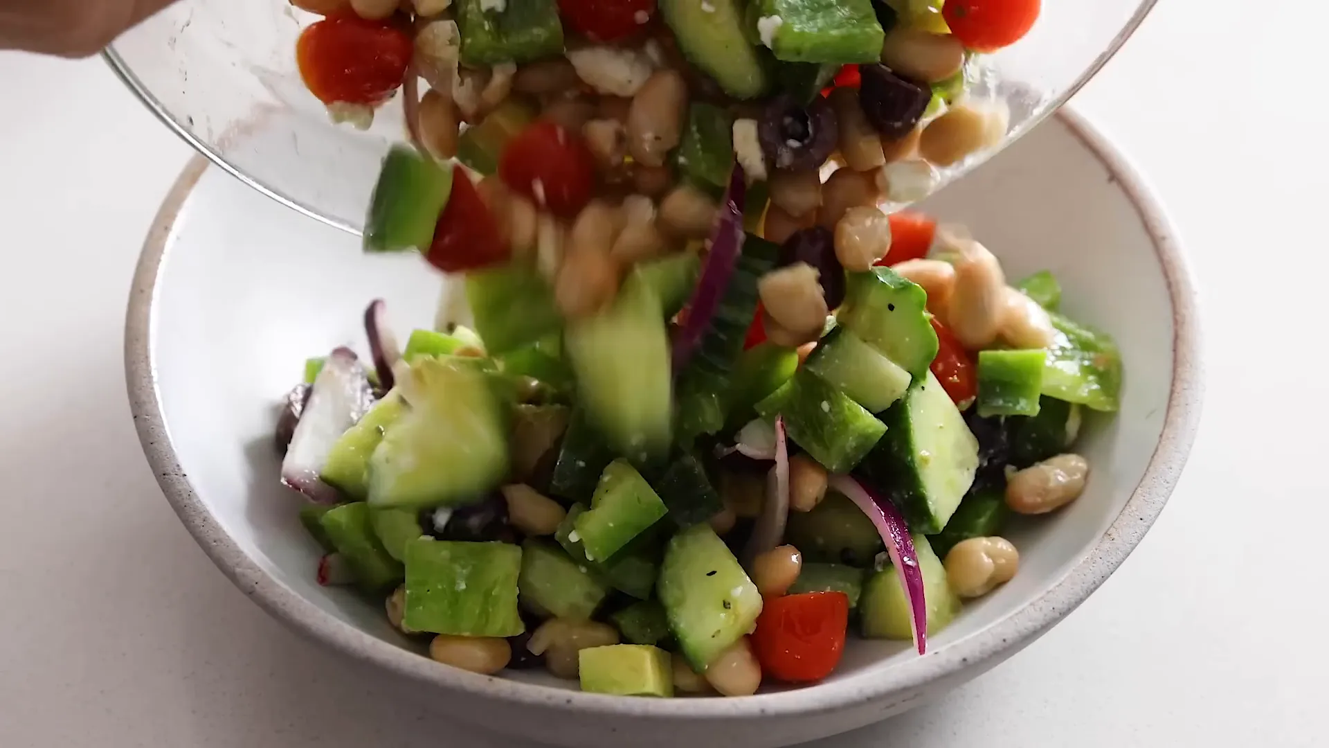 Greek salad served with chicken