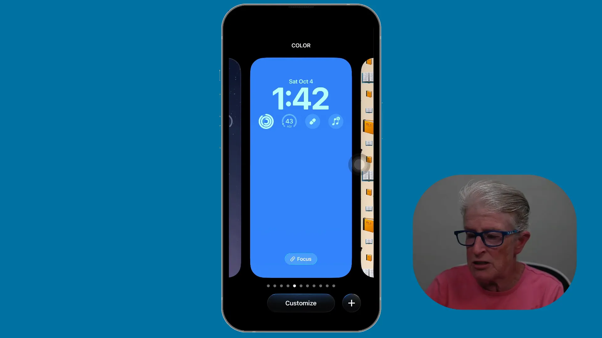 iPhone lock screen showing the default clock and wallpaper