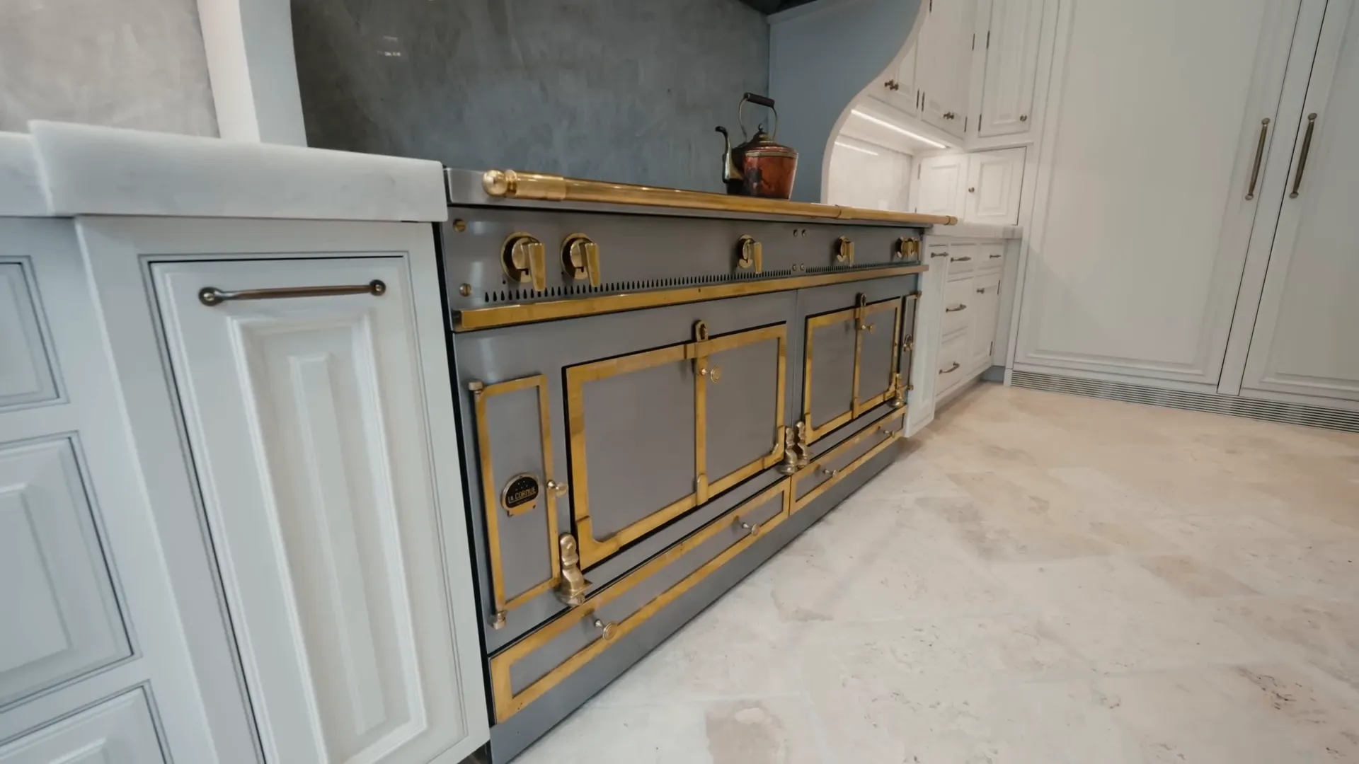 A closer view of the kitchen's elegant layout and decor.