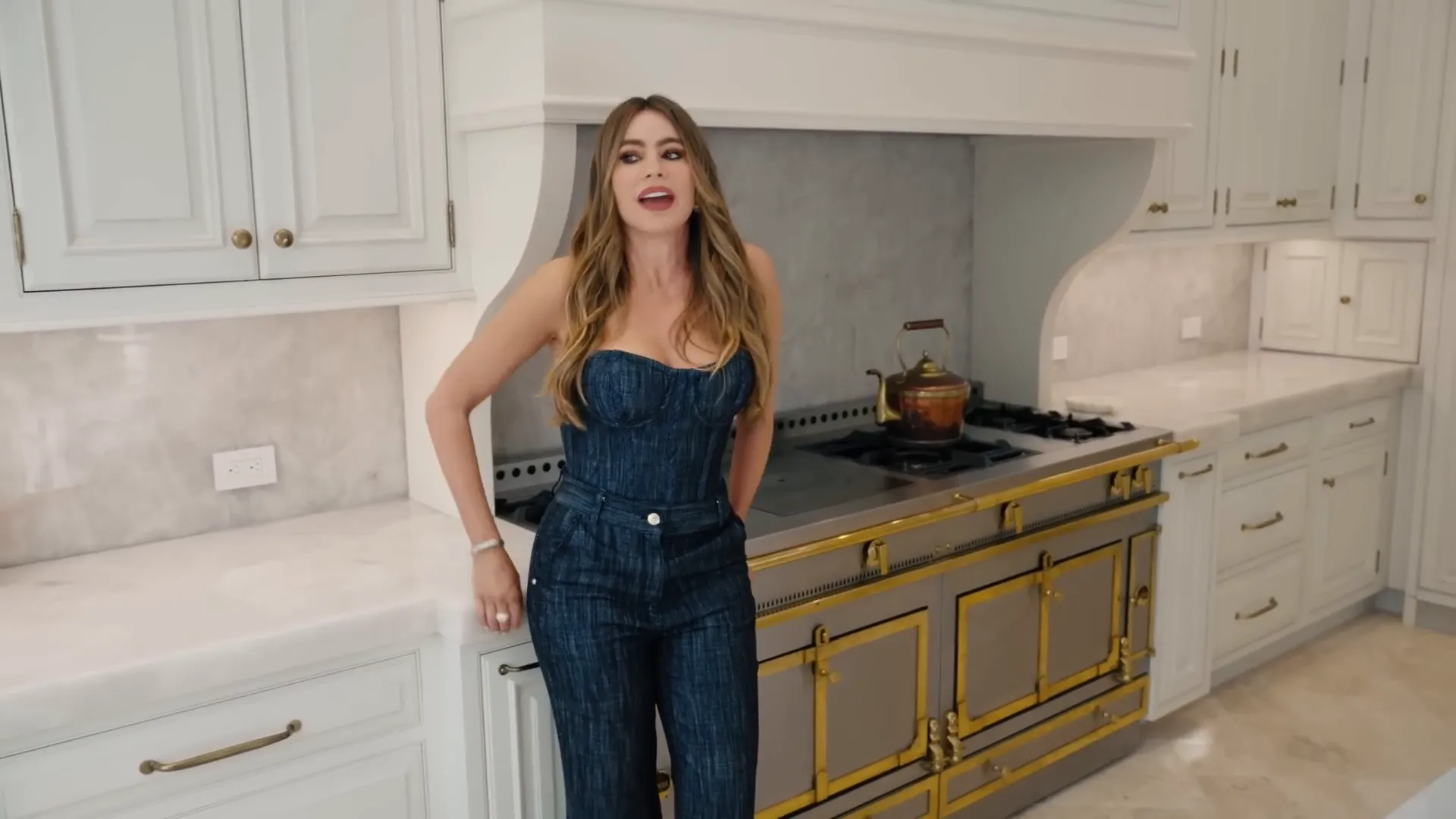 Sofía Vergara in her stylish kitchen with a Lacorne stove.